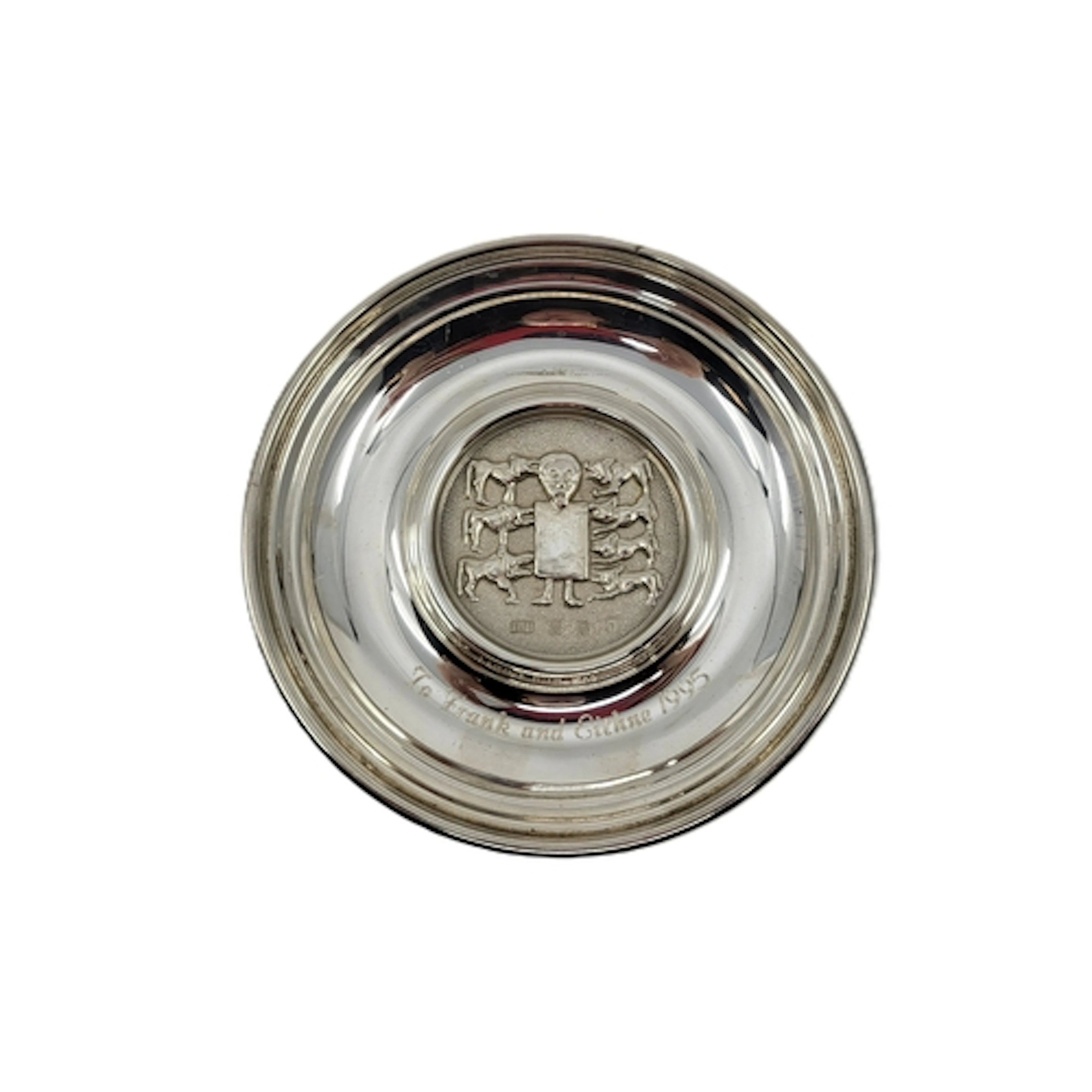A MODERN IRISH STERLING SILVER DISH, decorated from the high...