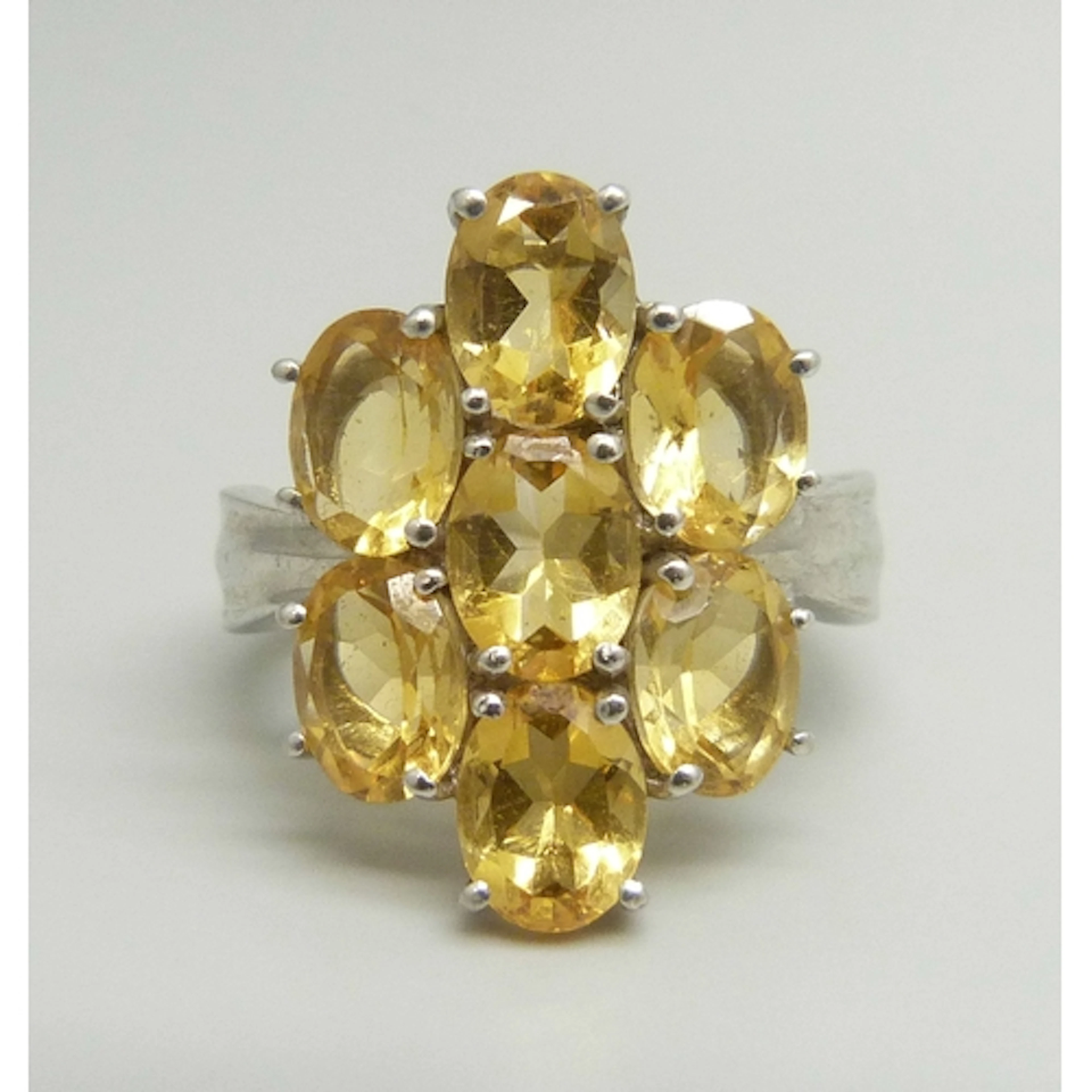 A TGGC statement silver and citrine cluster ring, 2.4cm, T/U