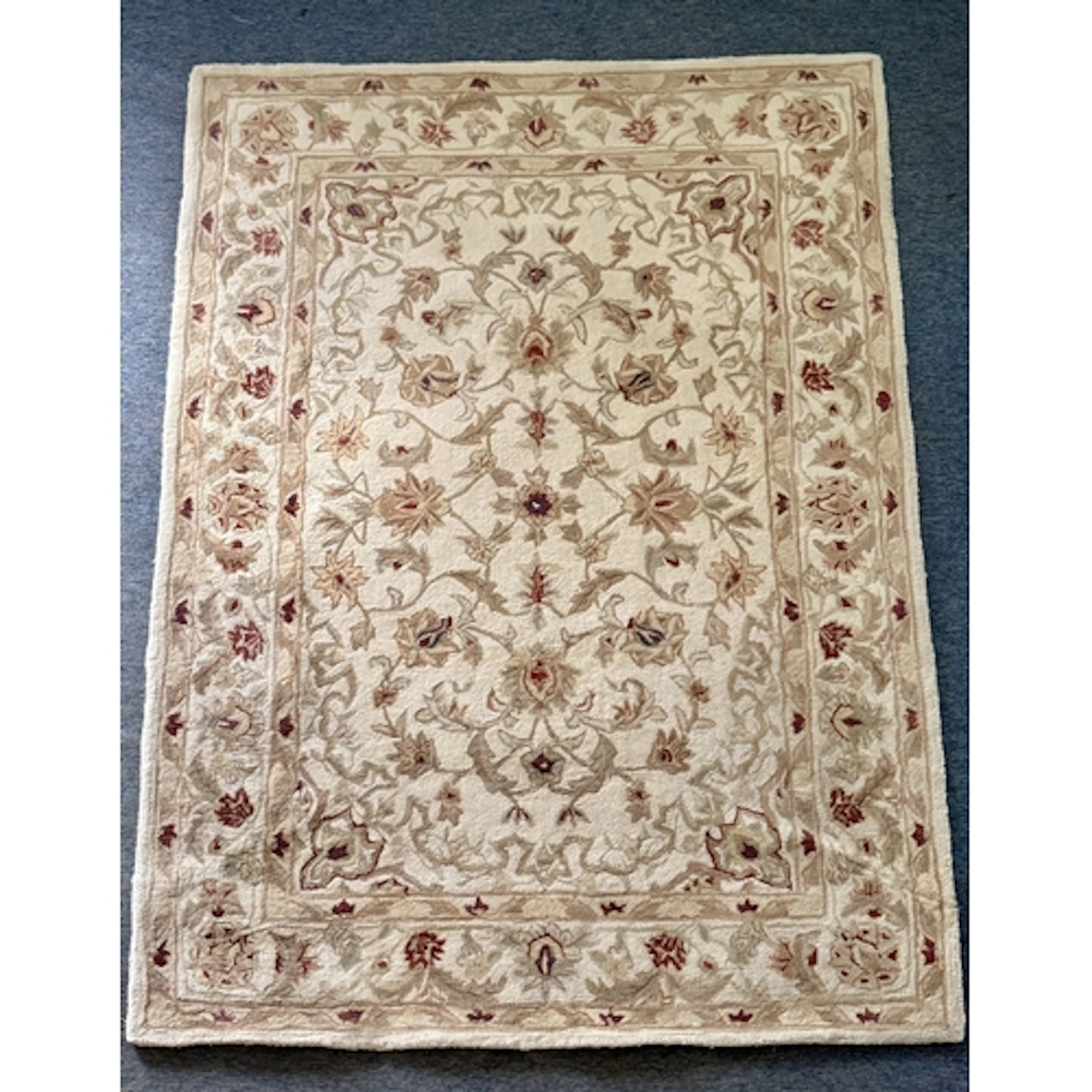 A modern machine-made Zeigler style wool rug - 234 x 169cm.