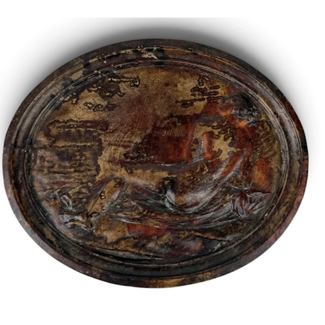 A NEOCLASSICAL PRESSED WAX PLAQUE OF A RECLINING NUDE LADY 1...