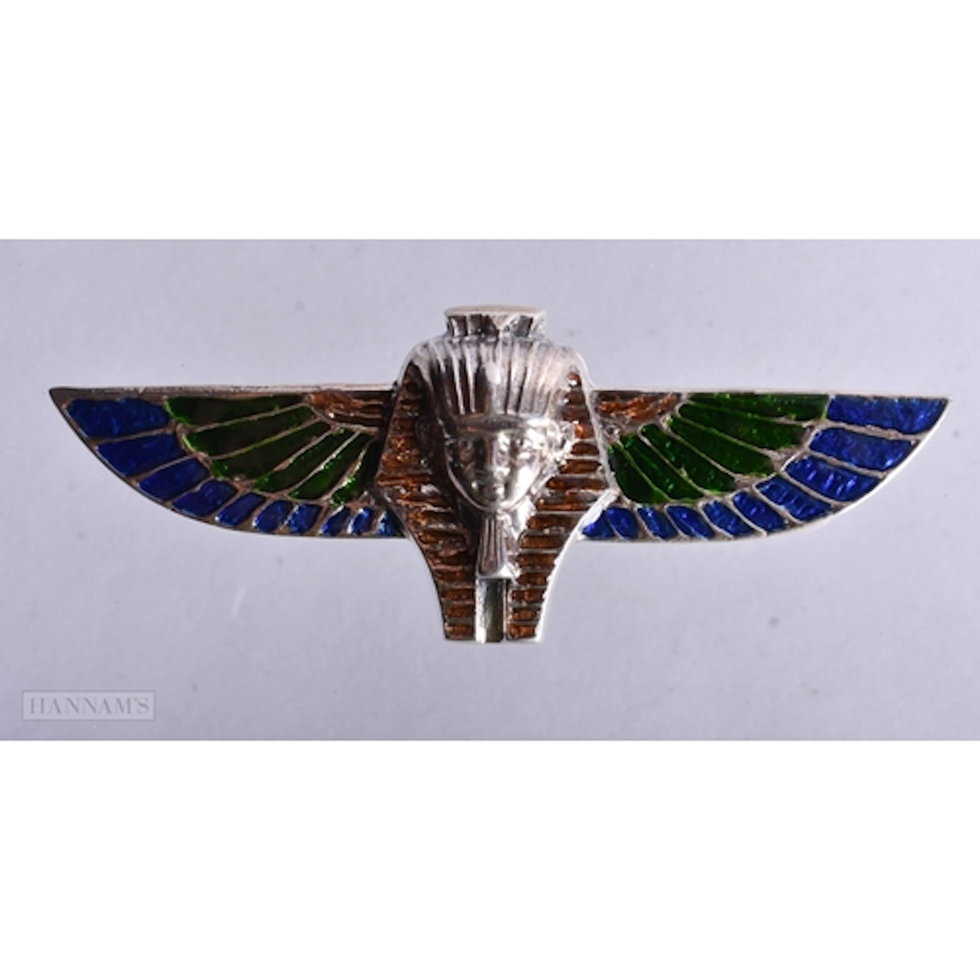 A SILVER AND ENAMEL PHARAOH BROOCH. 18.2 grams. 7.5 cm x 2.7...