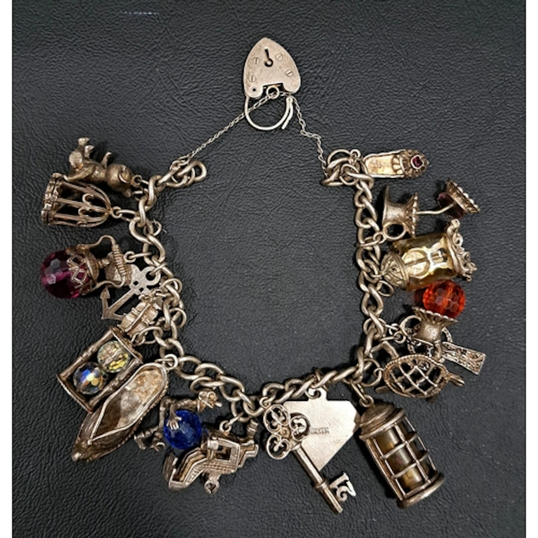 SILVER CHARM BRACELET the curb link bracelet with heart padl...