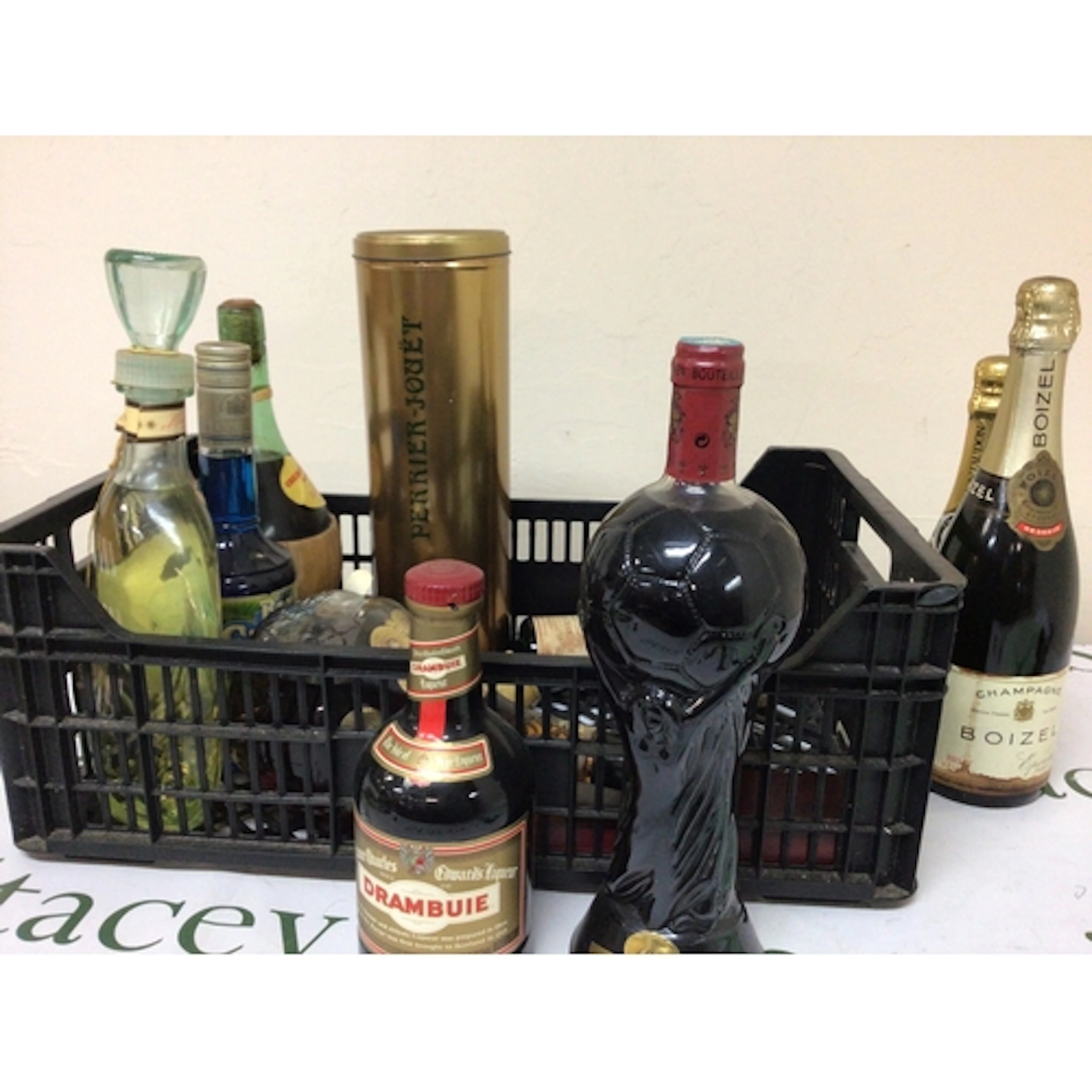 A collection of Champagne and spirits including a World Cup ...