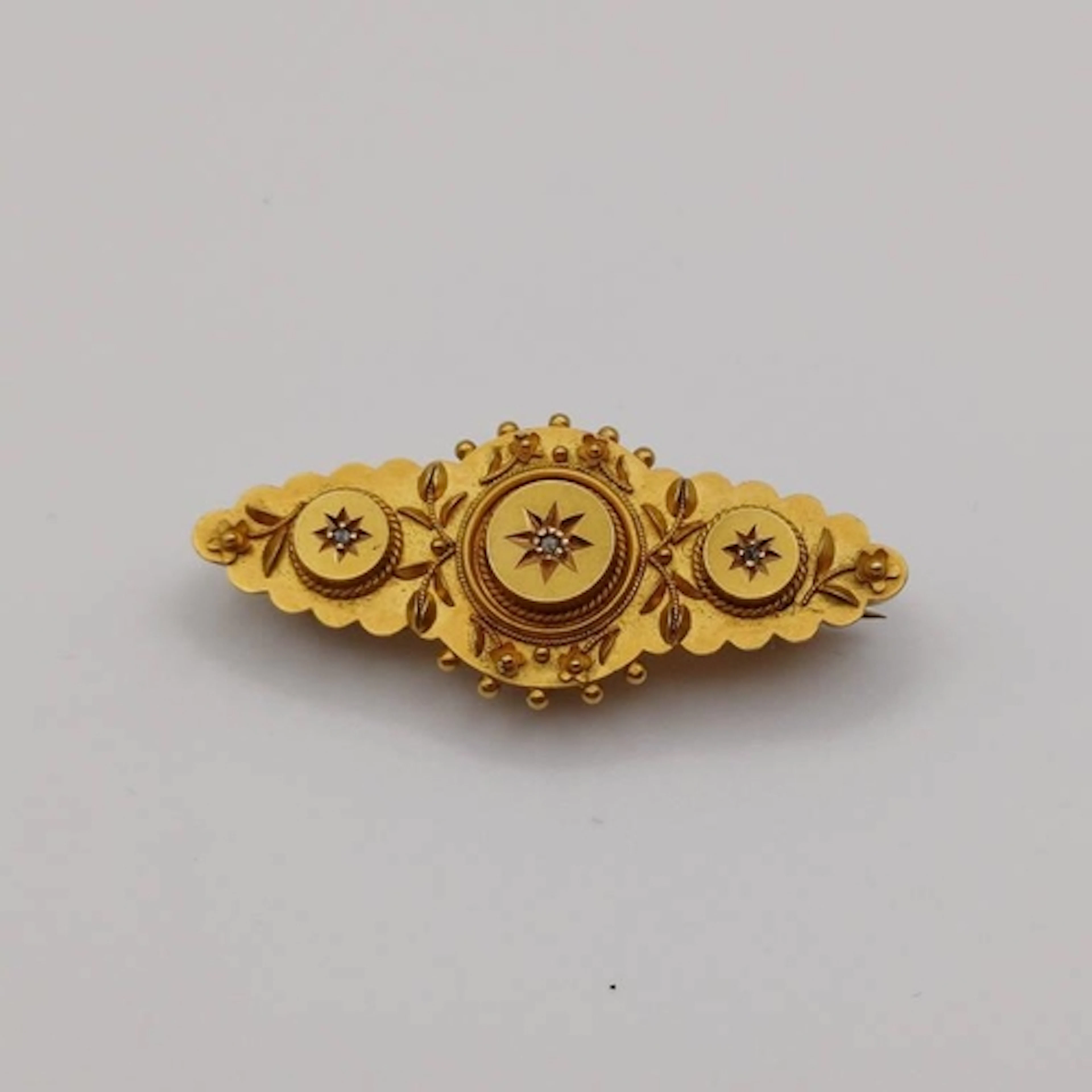 EARLY 20TH CENTURY 15CT GOLD DIAMOND SET BROOCH - 4.6G