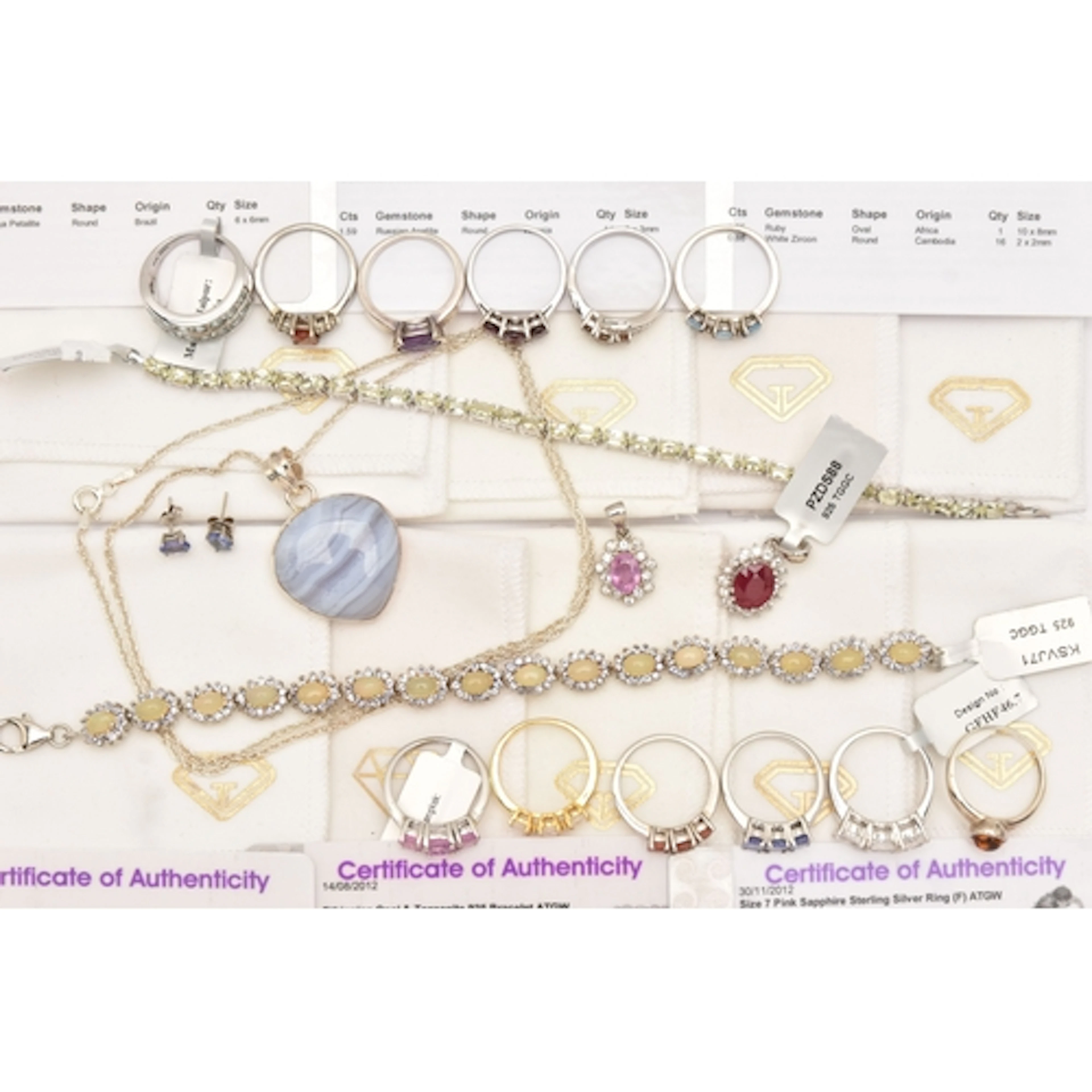 AN ASSORTMENT OF WHITE METAL GEM SET JEWELLERY, to include a...