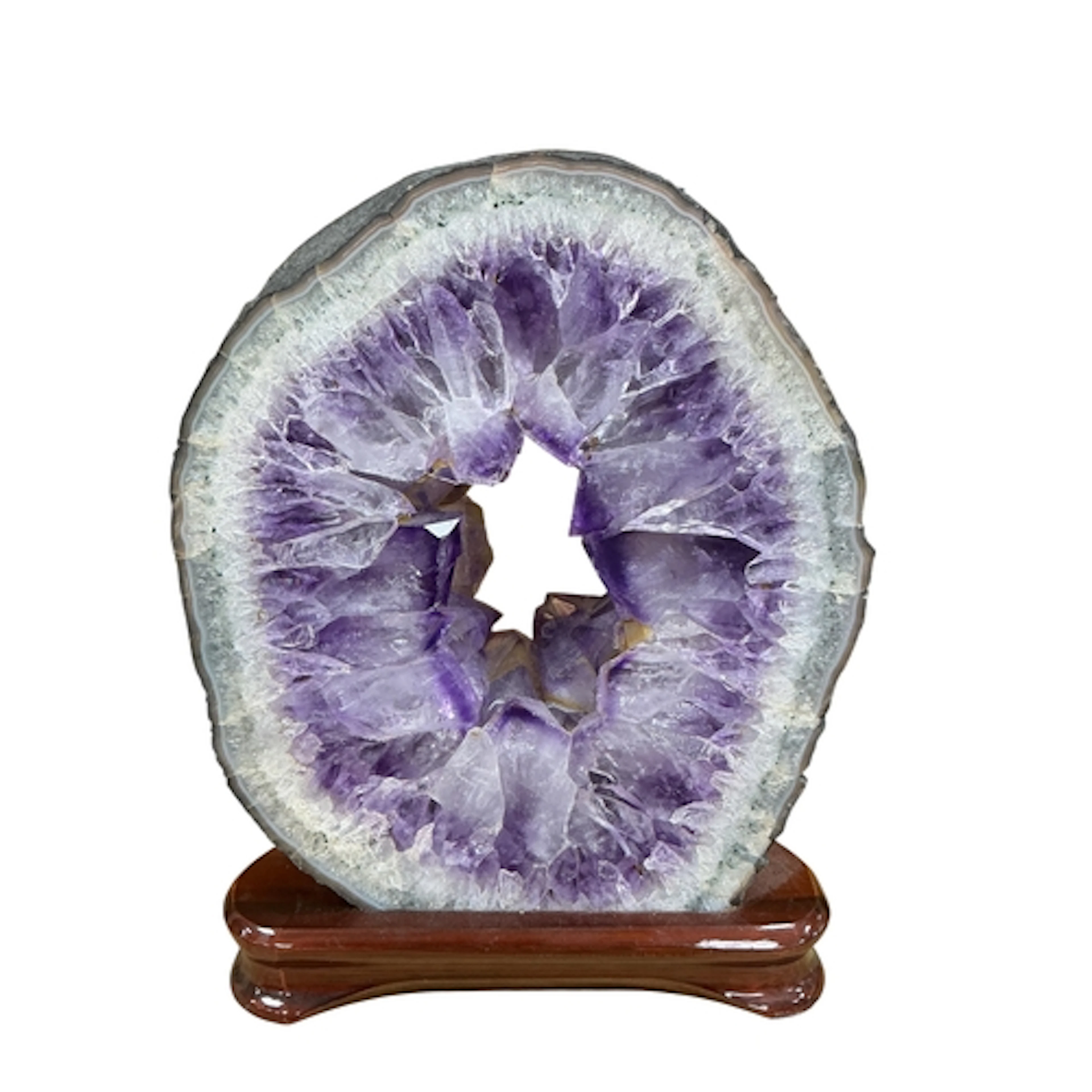 A circular cross section amethyst sample on stand, height 26...