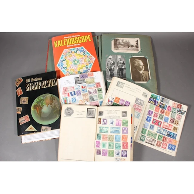 Postcard collection held in Art Nouveau style album containi...