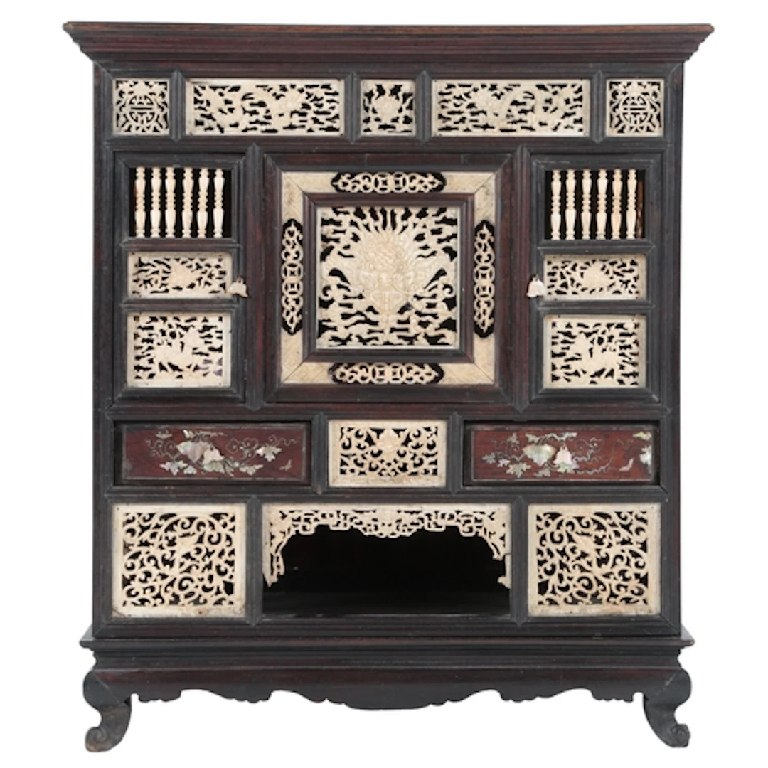 A Vietnamese hardwood and carved bone table cabinet, early 2...