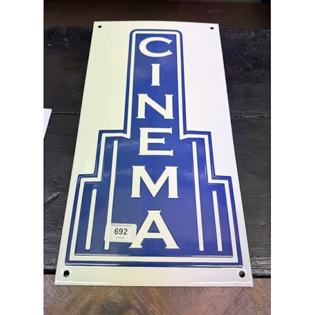 A blue and white enamelled Art Deco shaped cinema wall sign