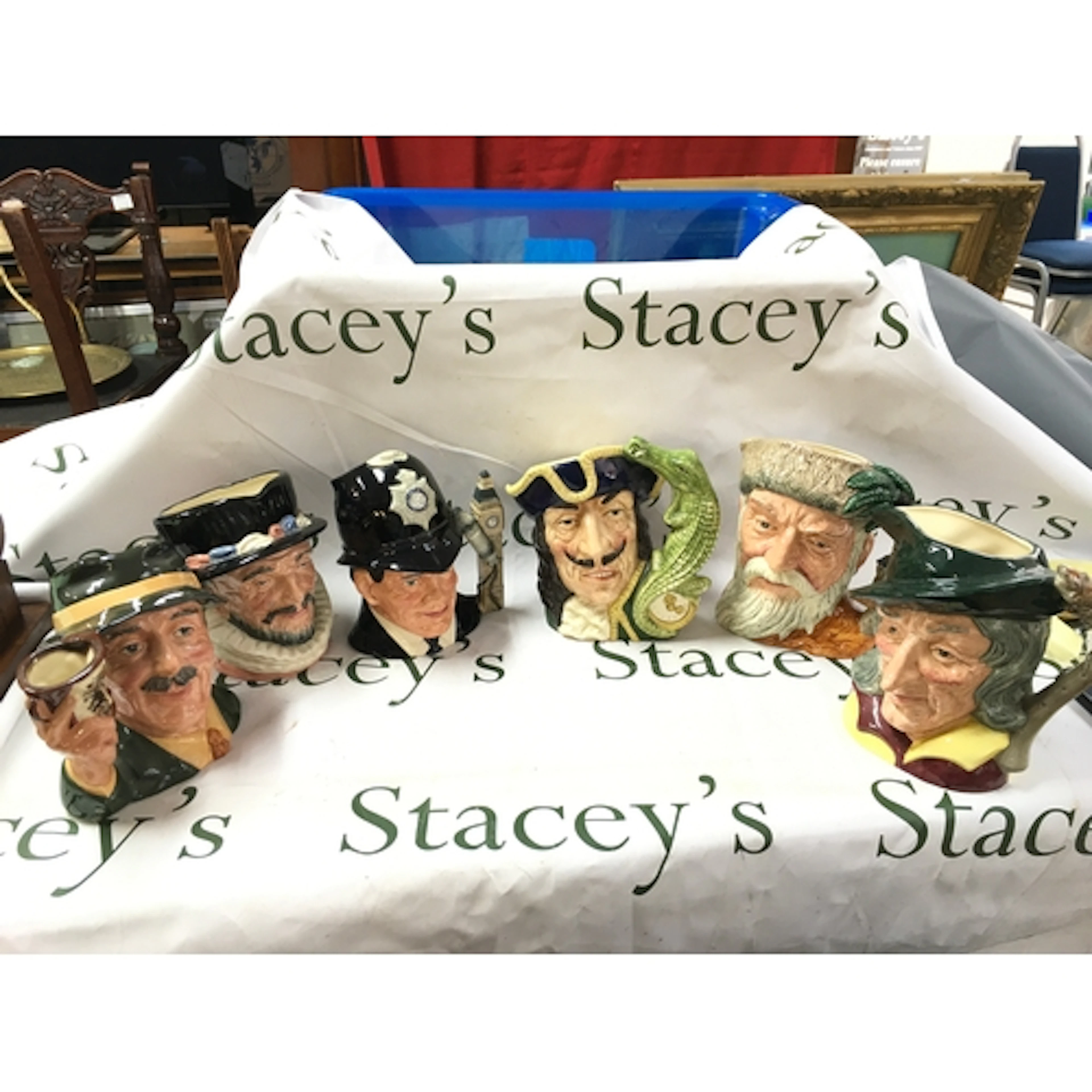 Six Royal Doulton character jugs including The Collector D67...
