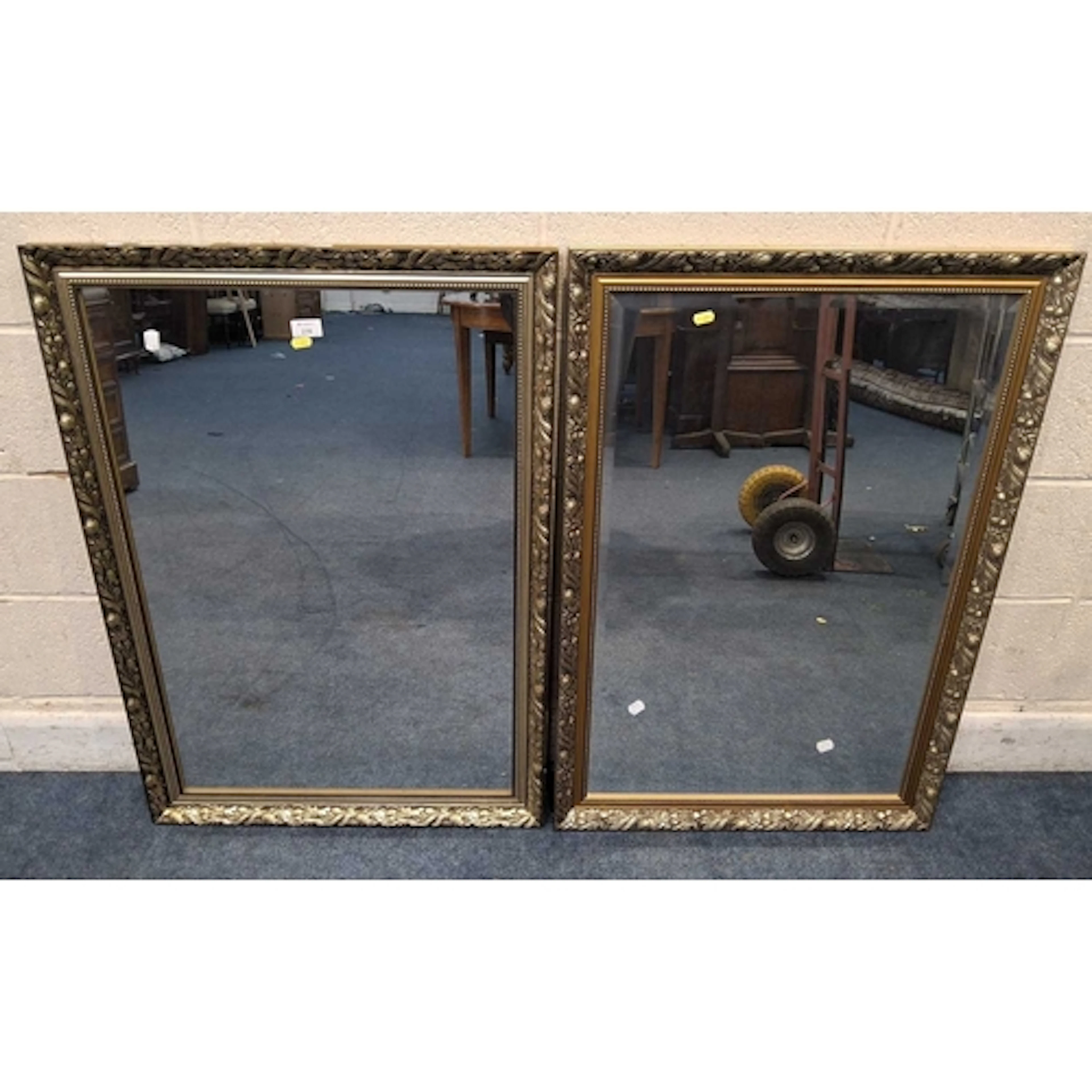 TWO GILT WOOD RECTANGULAR WALL MIRRORS, one with a bevelled ...