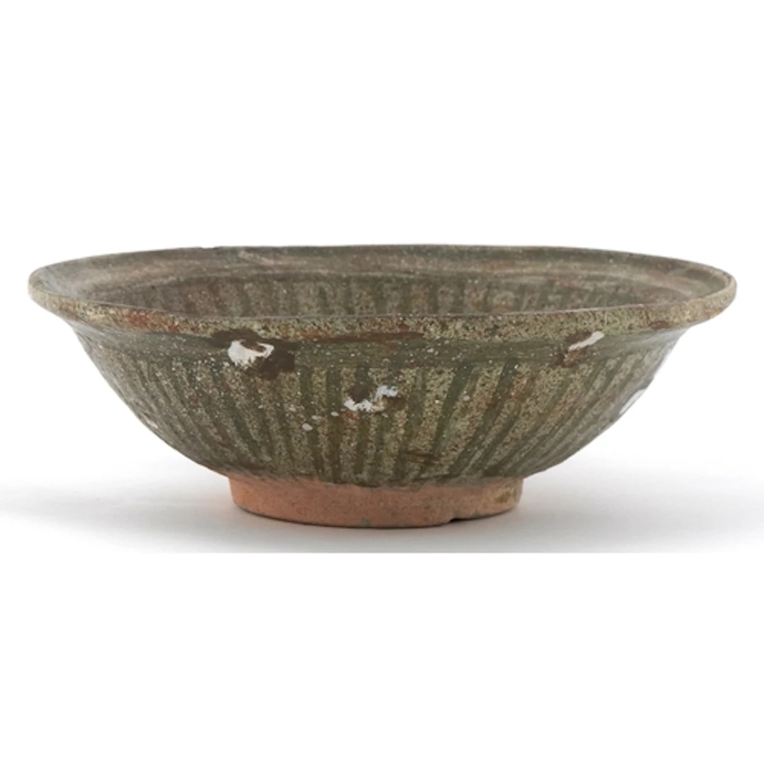 Antique Thai pottery celadon bowl hand painted with green ve...