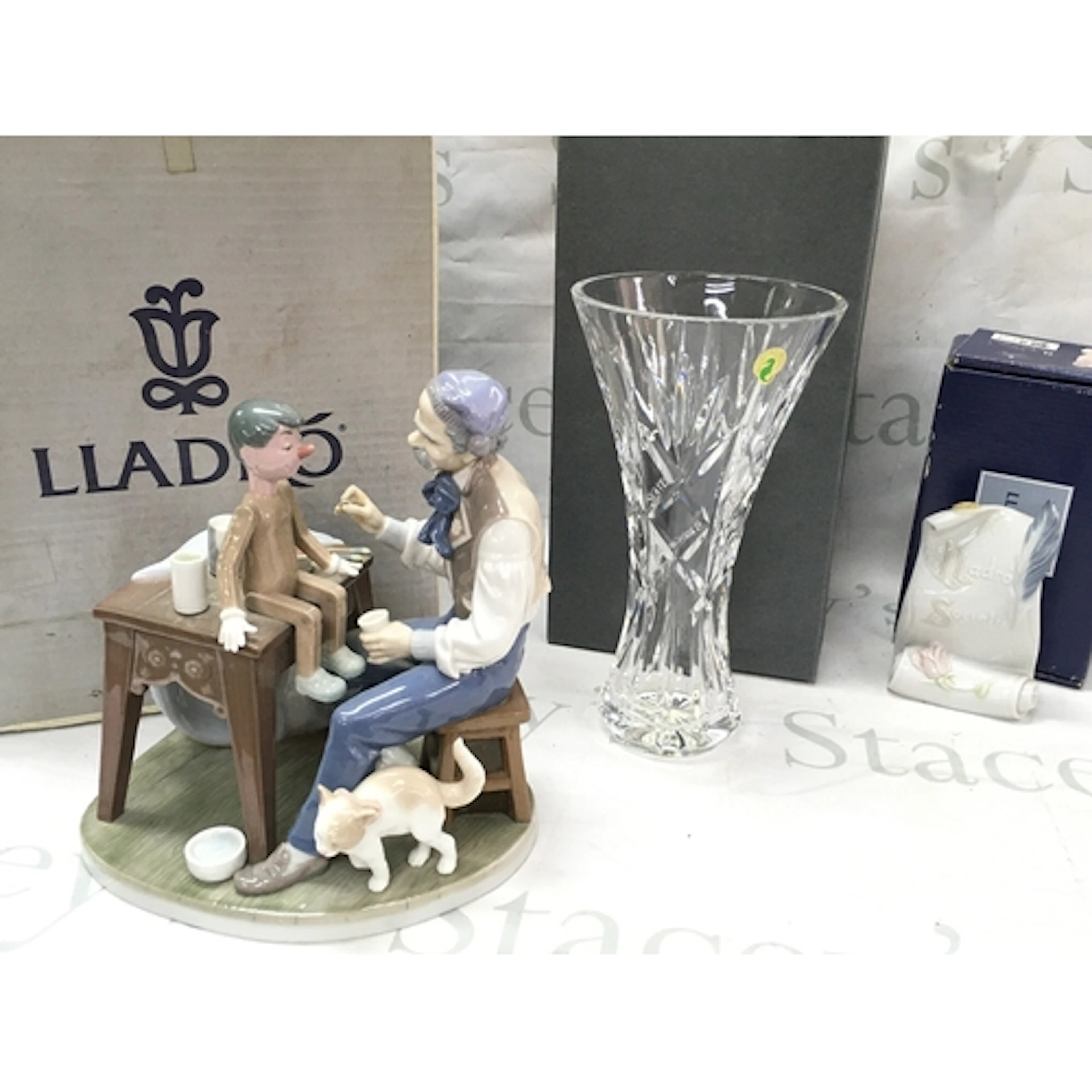 A boxed Lladro figure group The Puppet Painter , boxed Lladr...