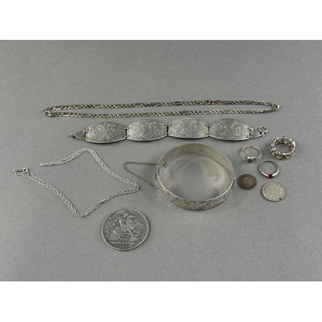 Jewellery: a silver four panel bracelet, Birmingham 1941, en...
