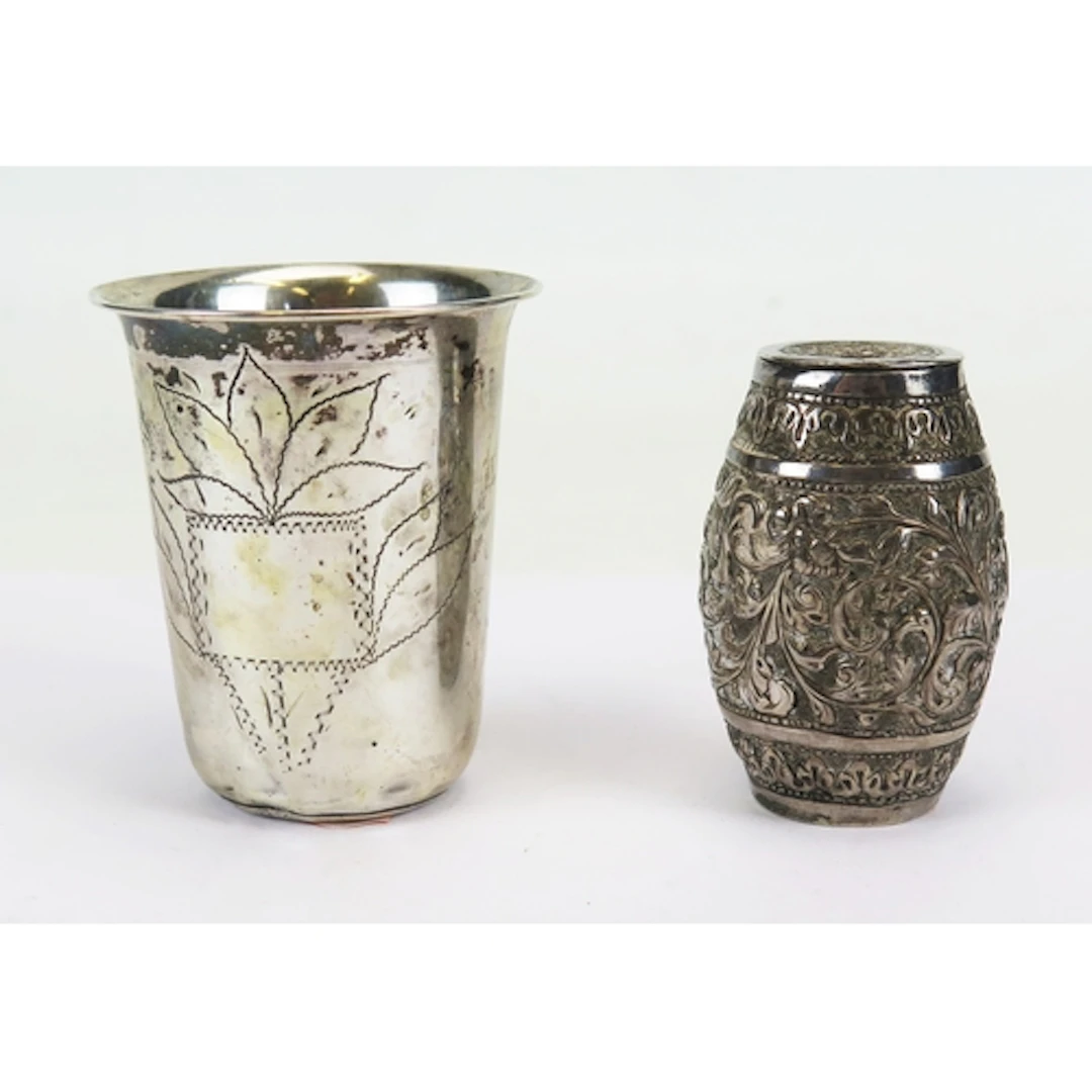 A continental .800 silver beaker, 7.5cm high, 29.5g, togethe...