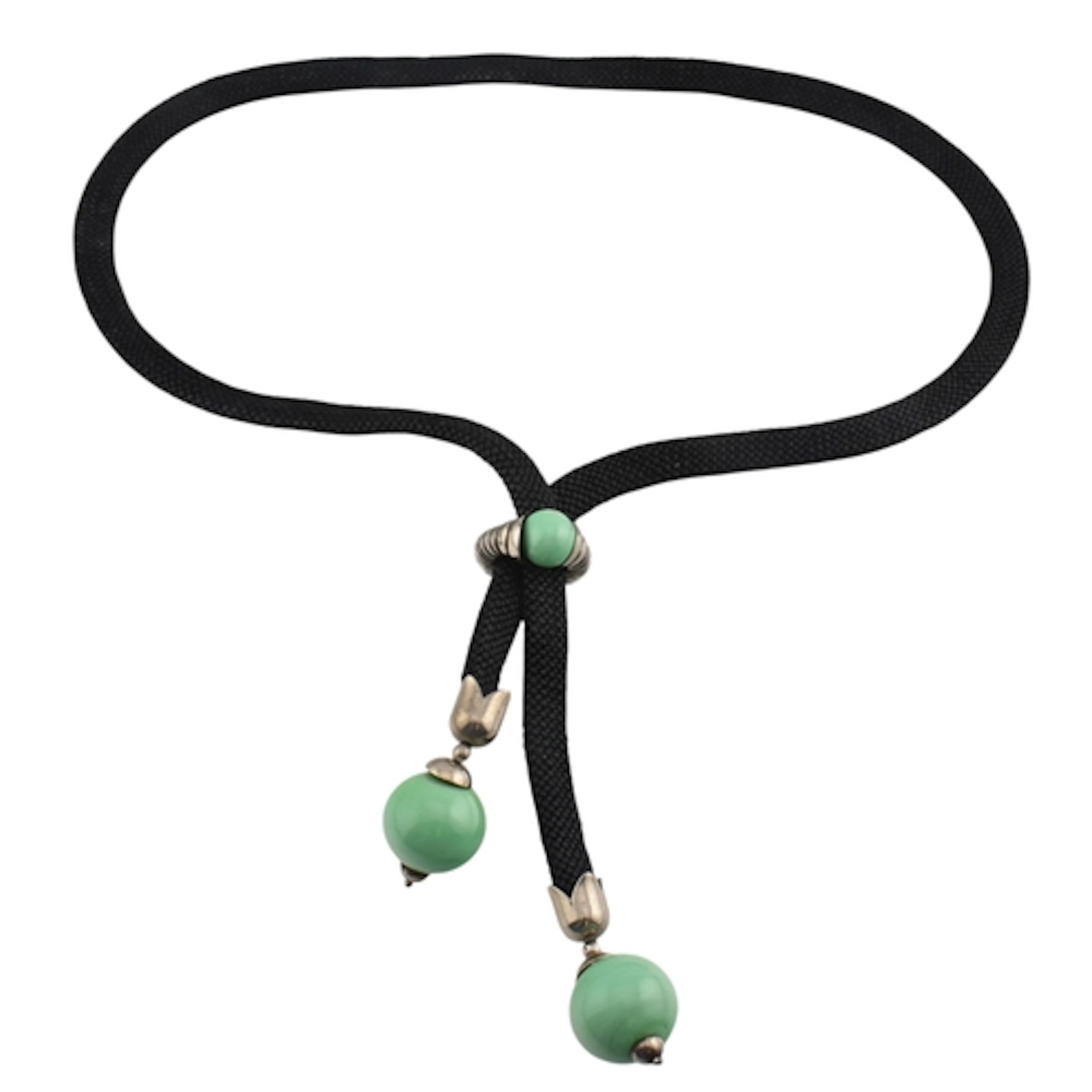 Art Deco black cord and green glass bead lariat necklace. Th...