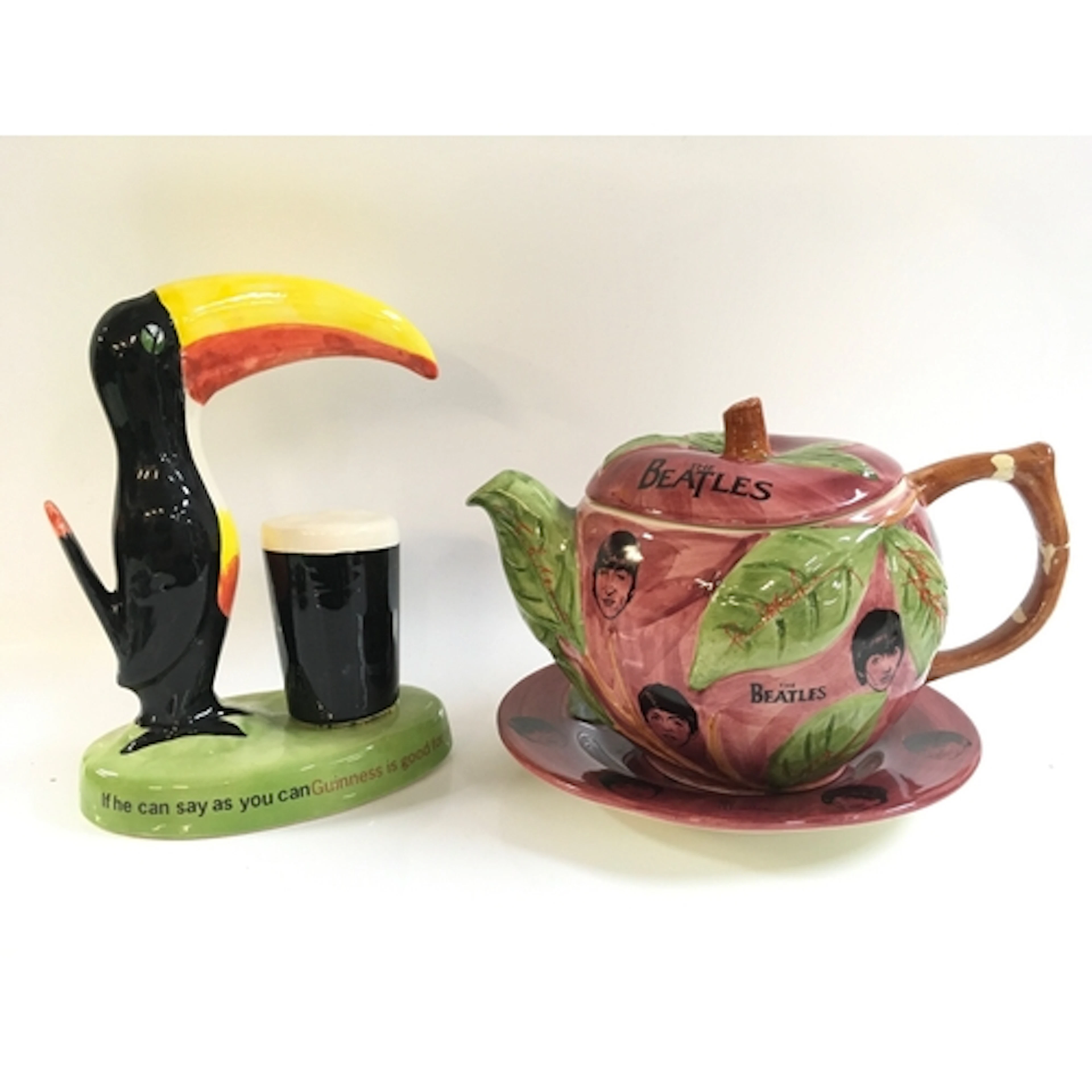 A Carltonware Guinness toucan figure and The Beatles Washing...