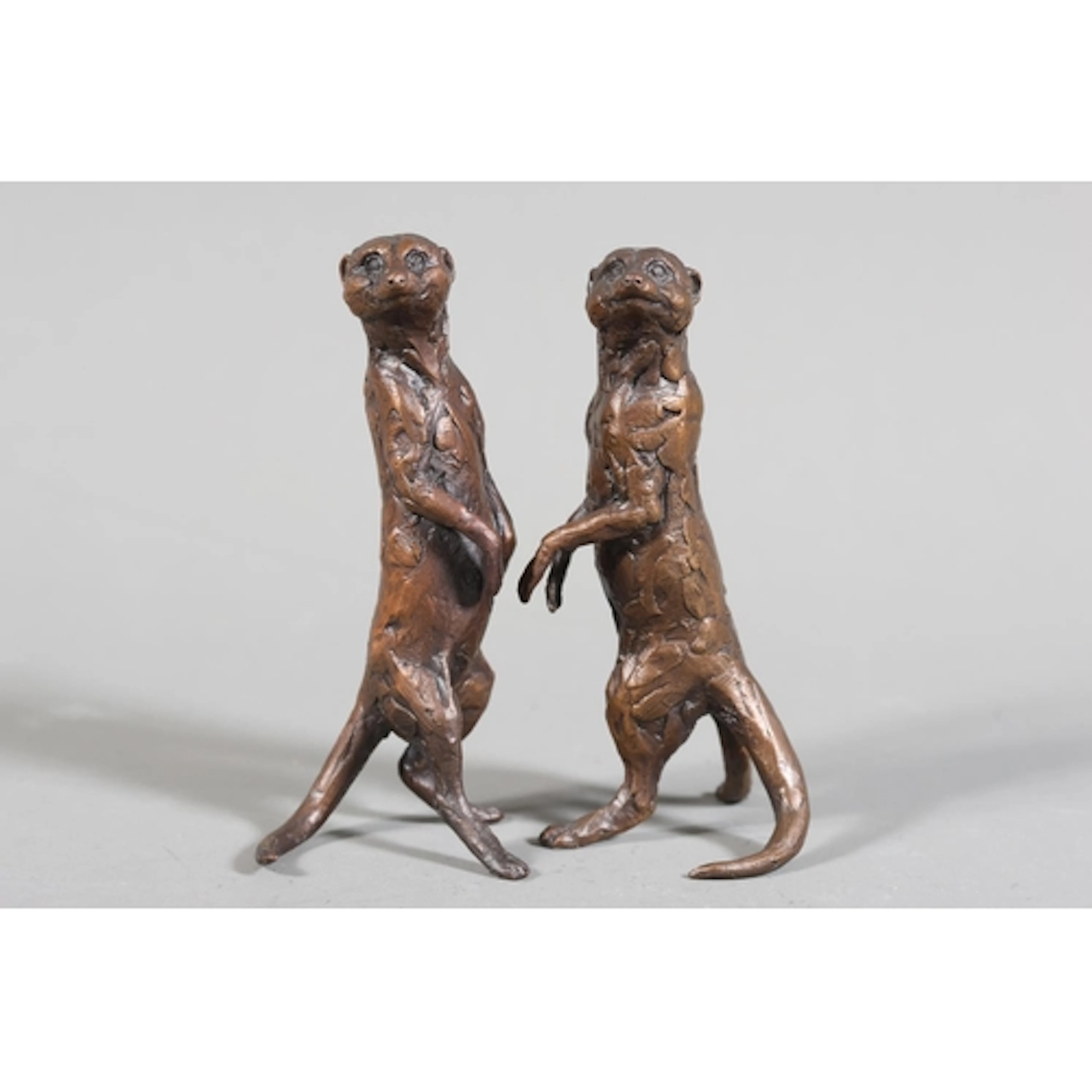 Pair of modern bronze meercats, 9.5cm