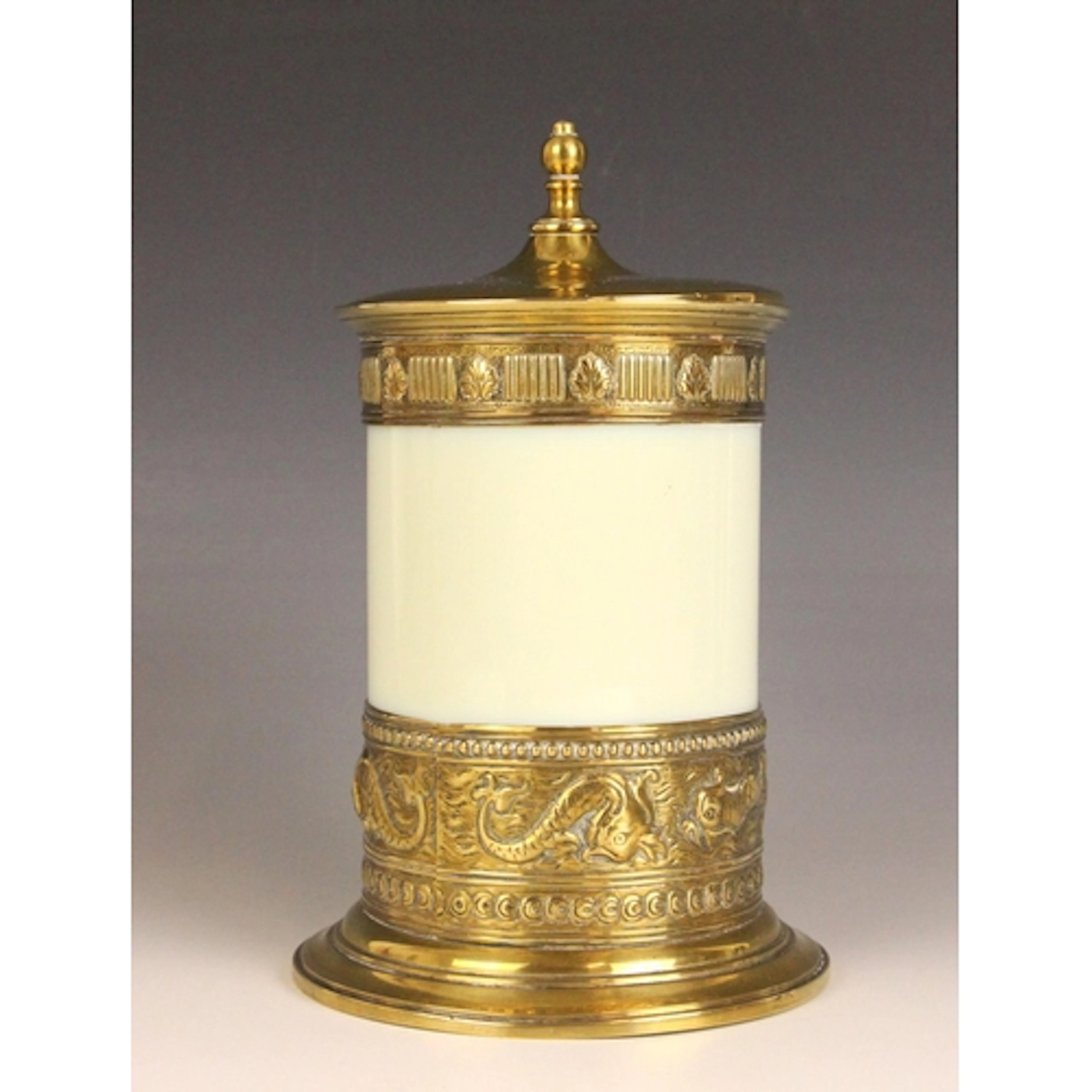 A brass mounted uranium 'custard glass' tobacco jar and cove...