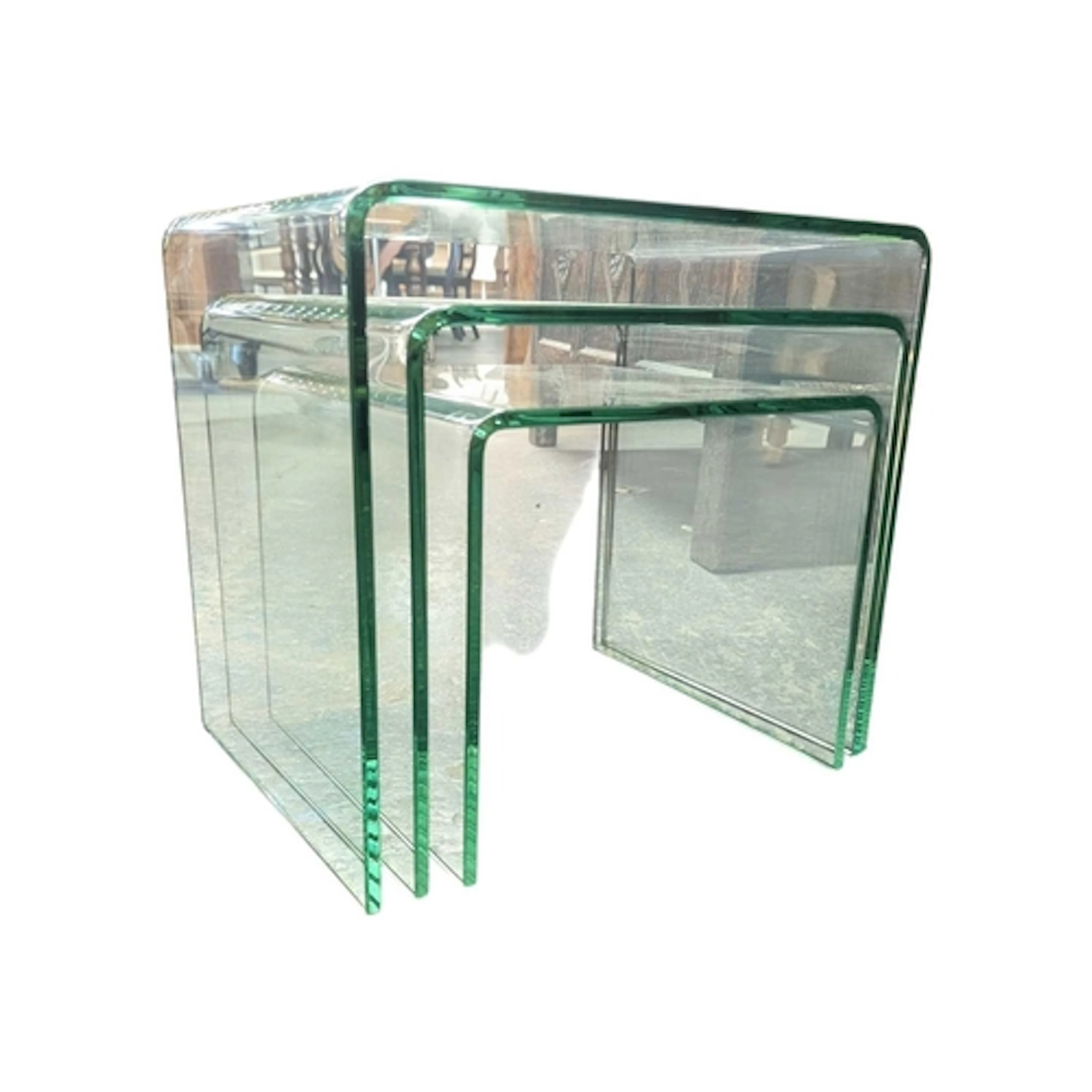 A contemporary modernist / minimalist nest of glass tables. ...