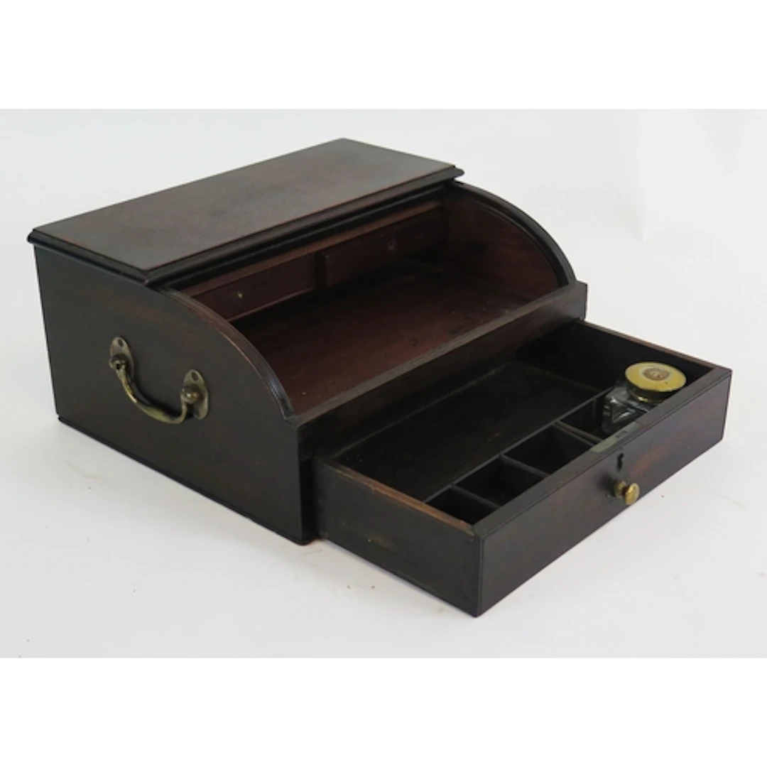 A 19th century mahogany stationery box, with tambour front a...