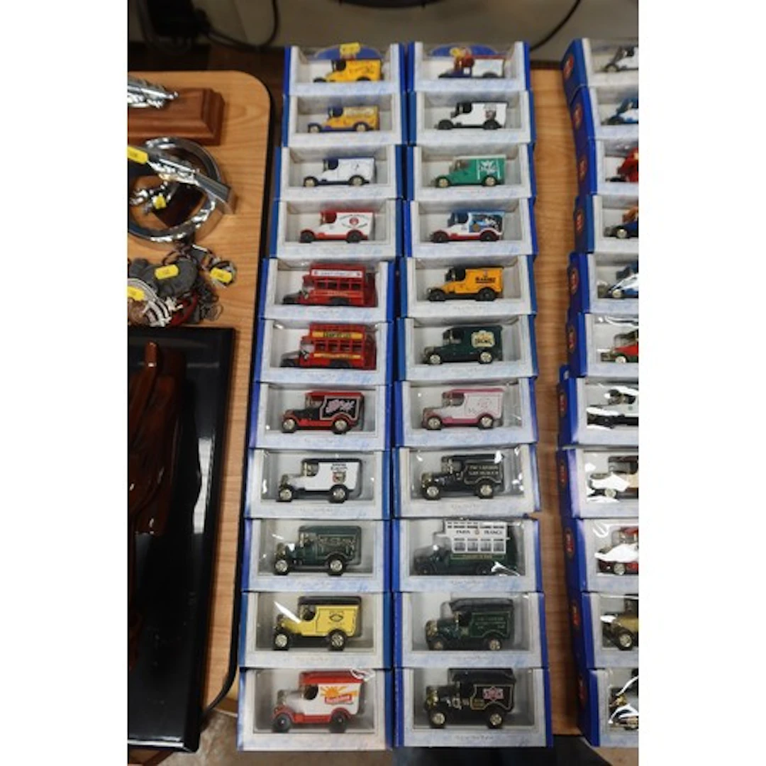 22 boxed Oxford Die Cast Advertising Vans