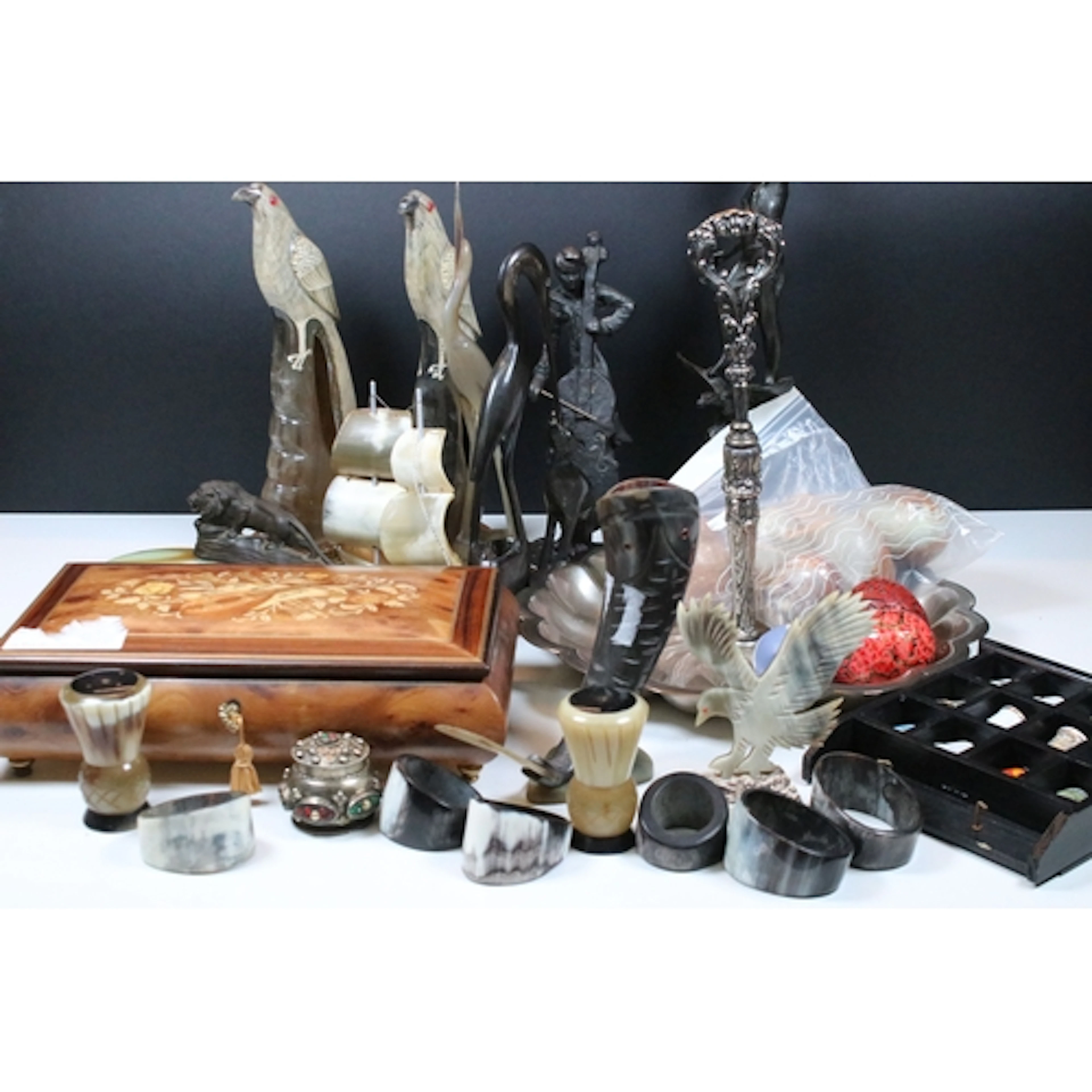 Collection of polished stone eggs, comprising agate examples...