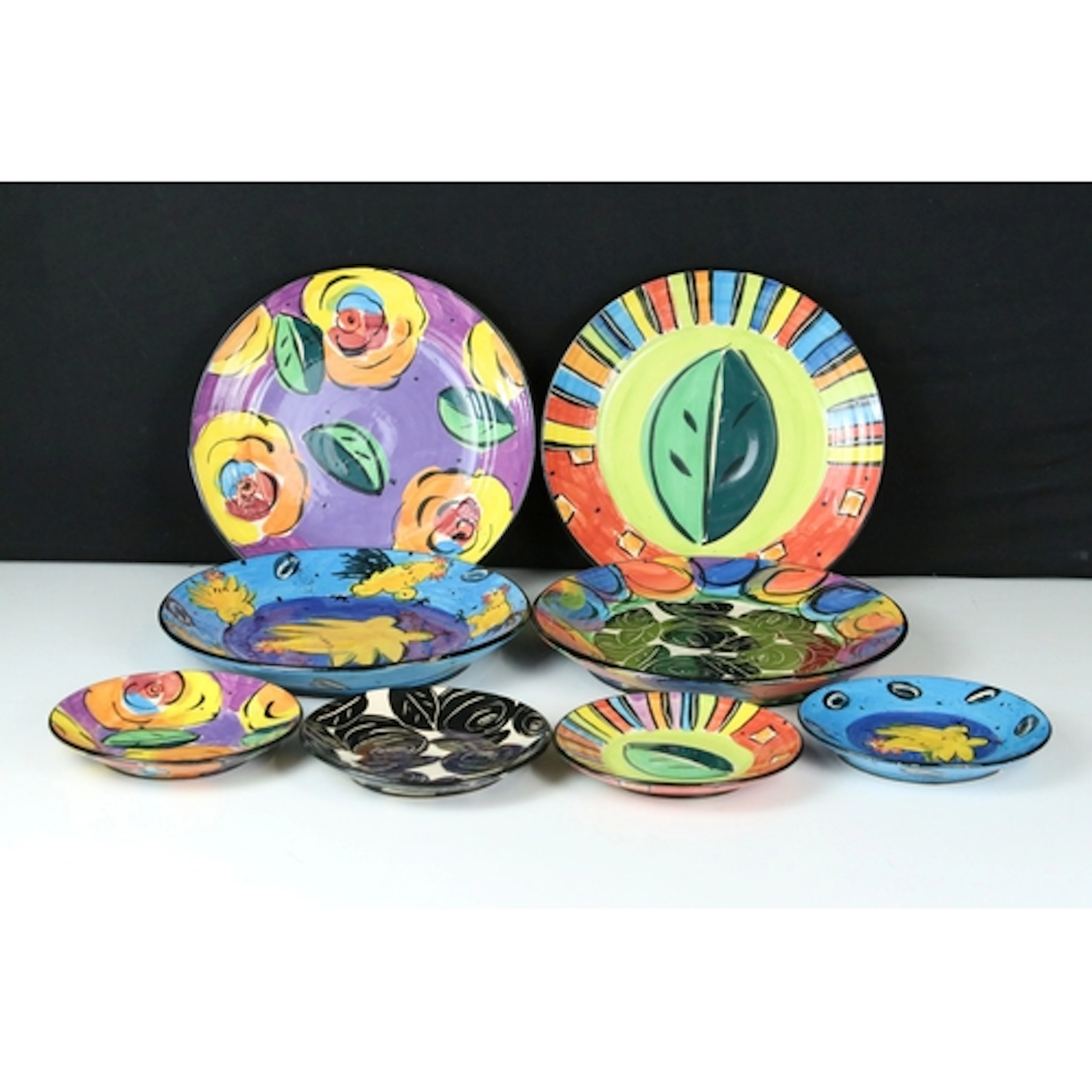 Mary Rose Young (b. 1958) a collection of studio pottery pla...
