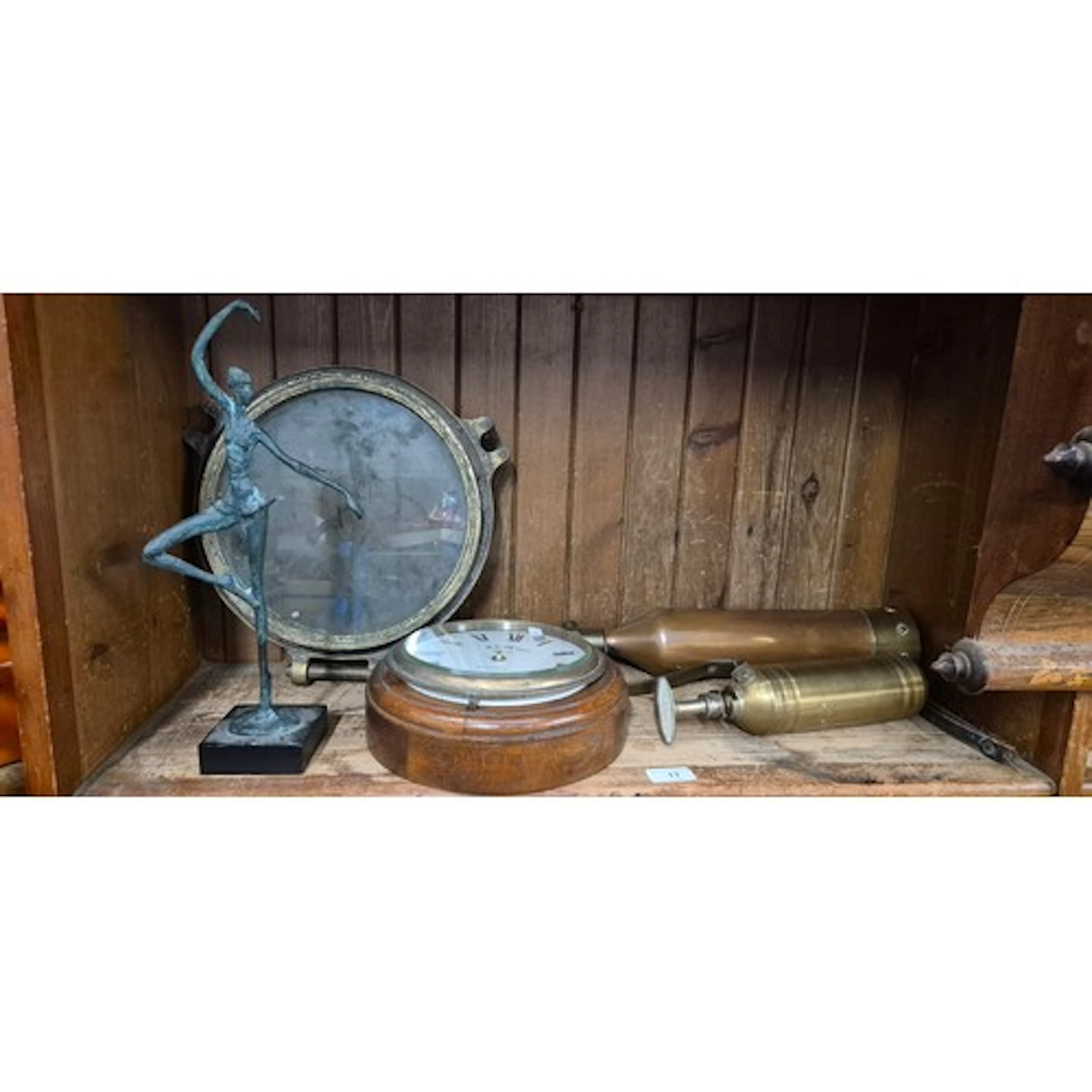 2 vintage fire extinguishers, a ship's porthole, and a coppe...