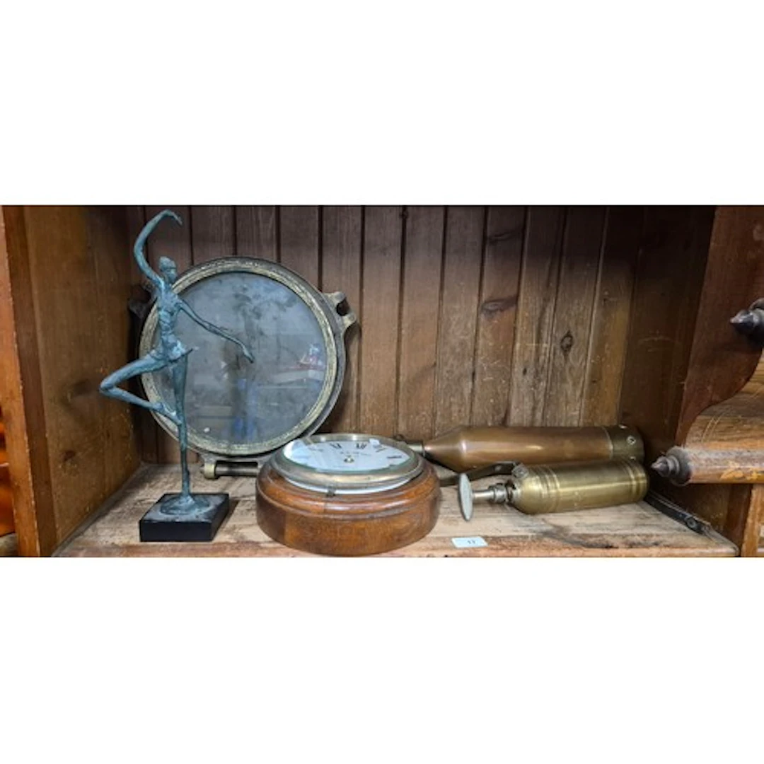 2 vintage fire extinguishers, a ship's porthole, and a coppe...