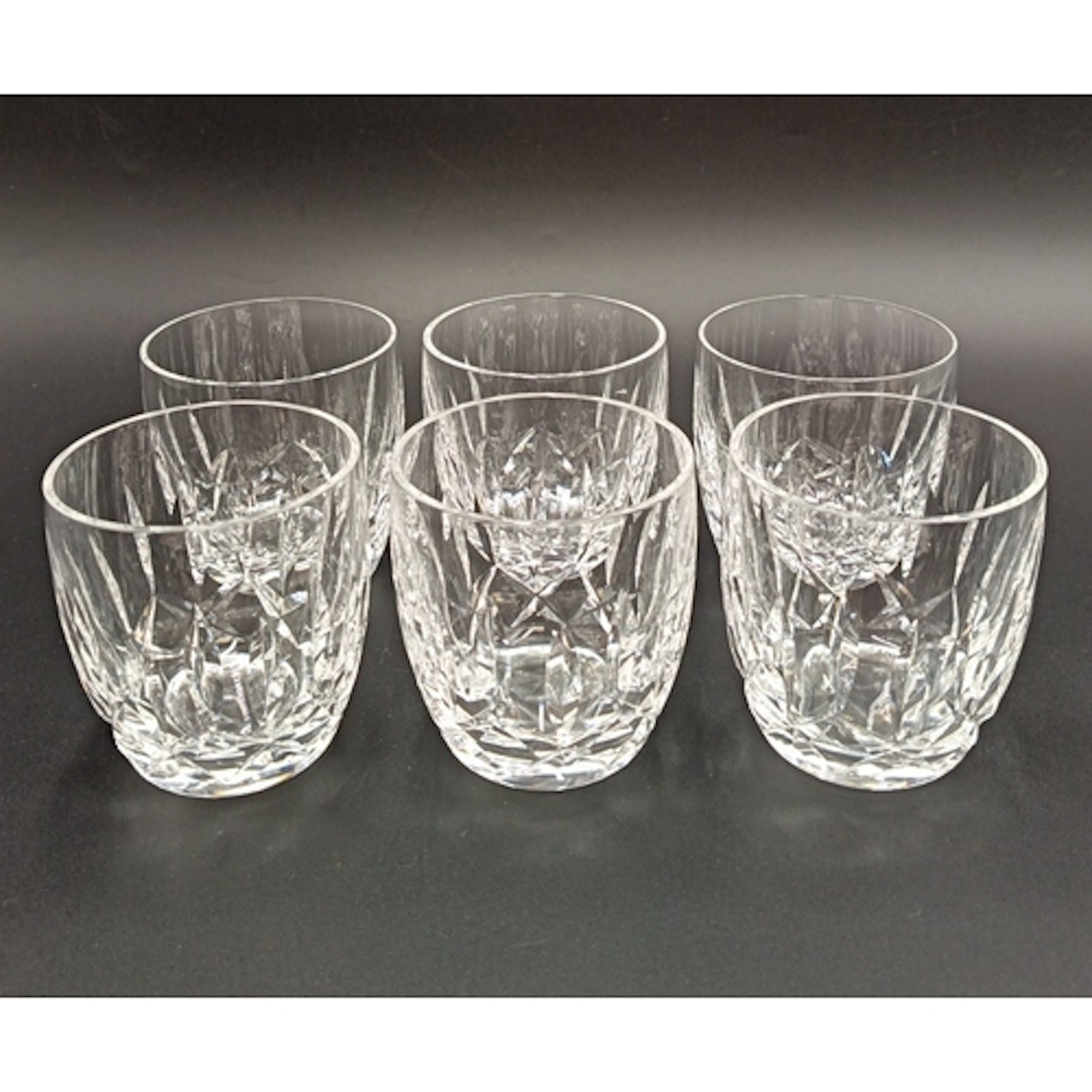 Set of six Waterford Crystal whisky tumblers, H: 9cm.