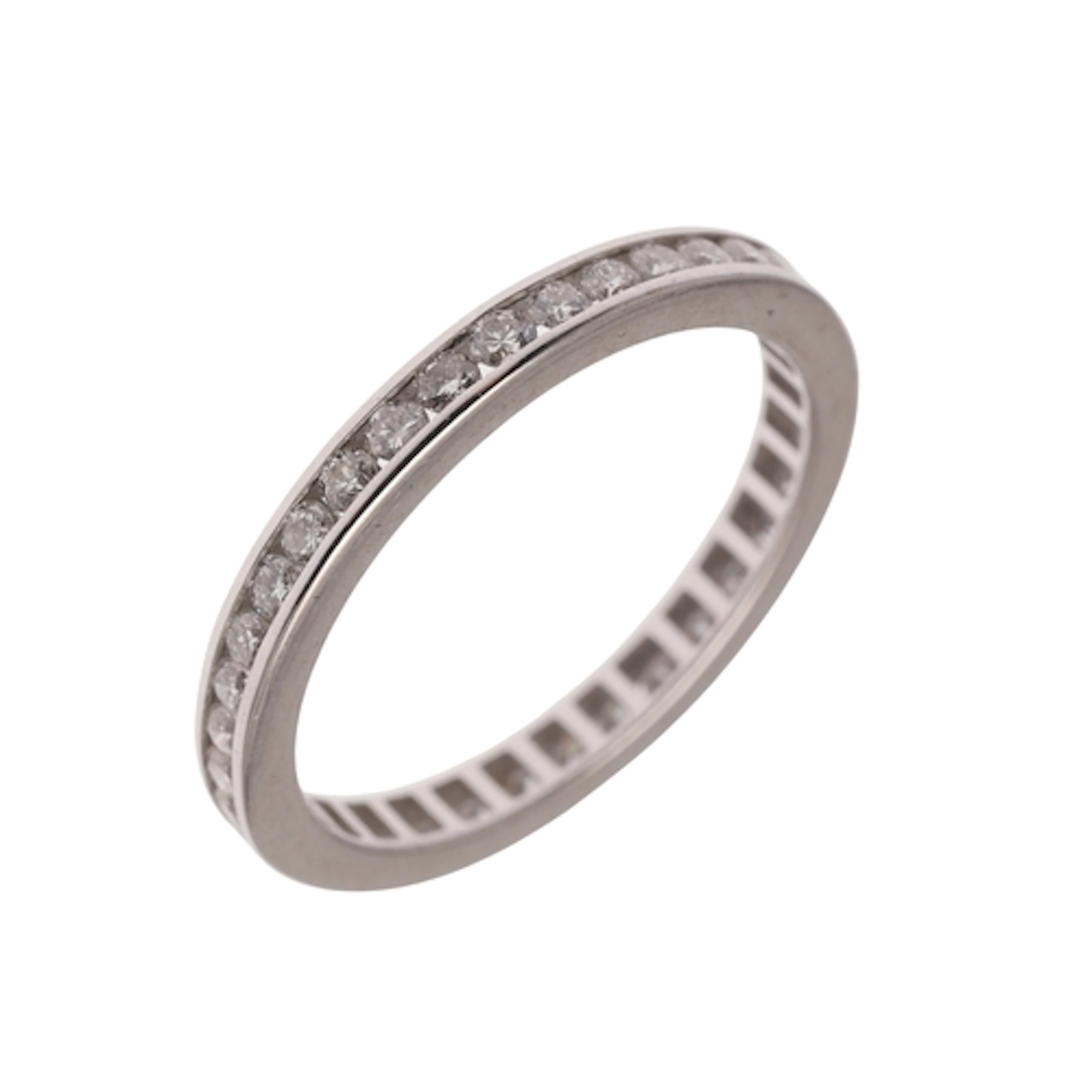 A DIAMOND FULL CIRCLE ETERNITY RING. mounted with circular-c...