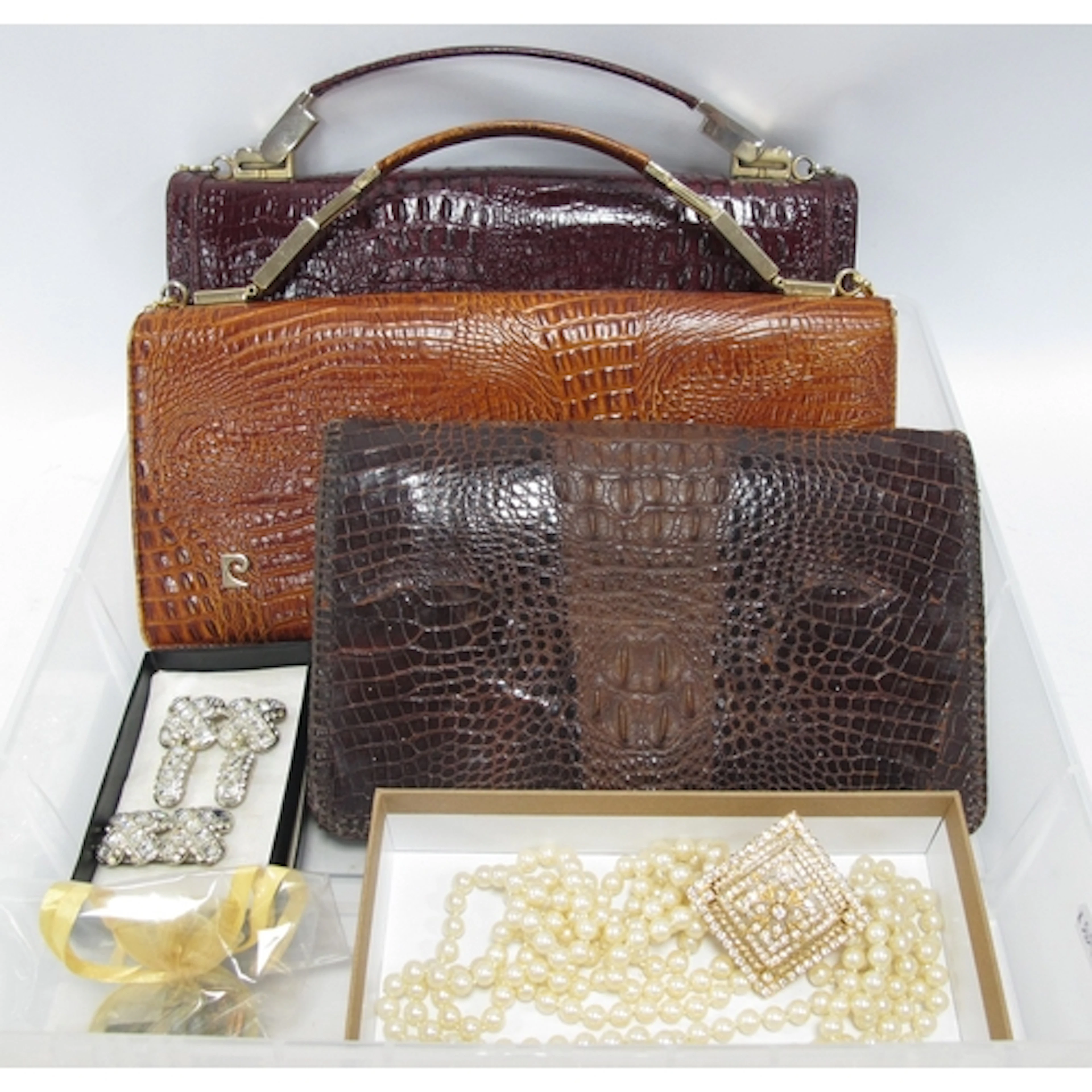 A Vintage Crocodile Skin Clutch Bag, two Pierre Cardin croc ...