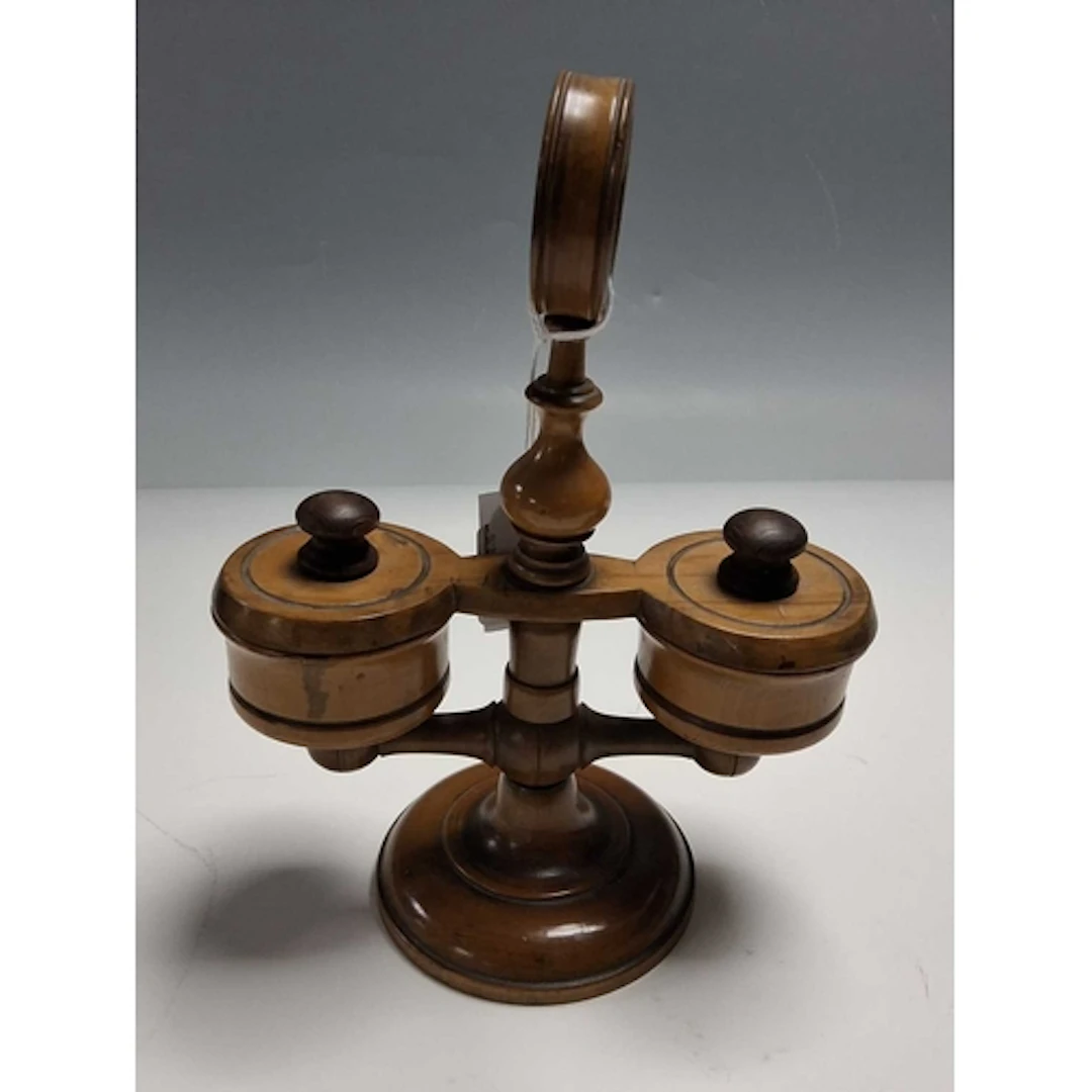 AN OLIVE WOOD CONDIMENT SET, having two bowls for salt and p...