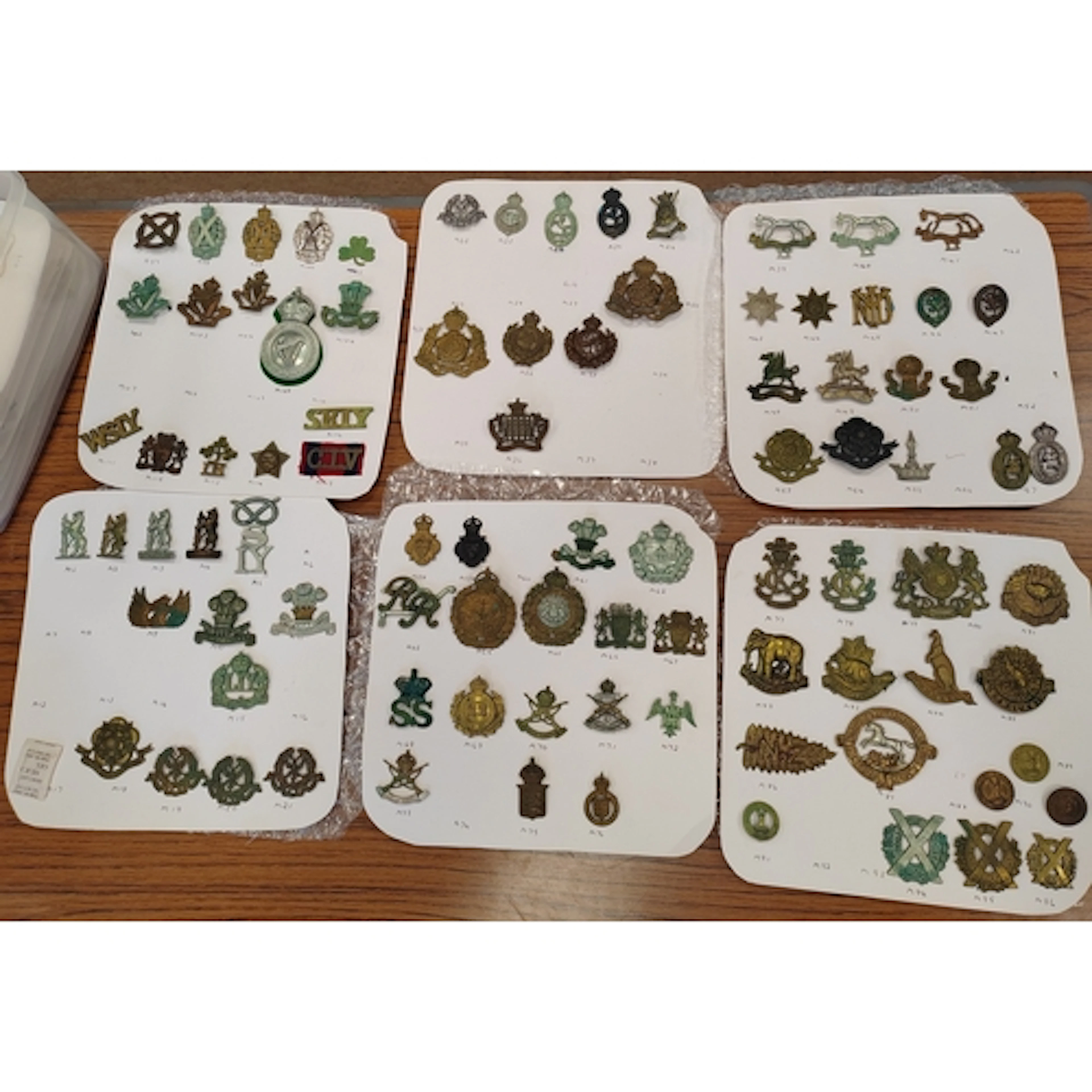 Collection of cap badges from various Militia regiments, Hom...