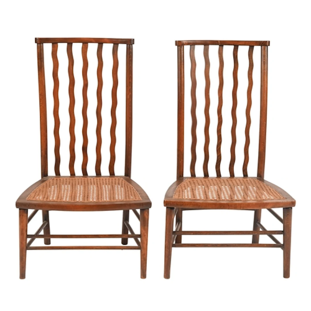 A pair of Arts & Crafts beech chairs, after a design by ...