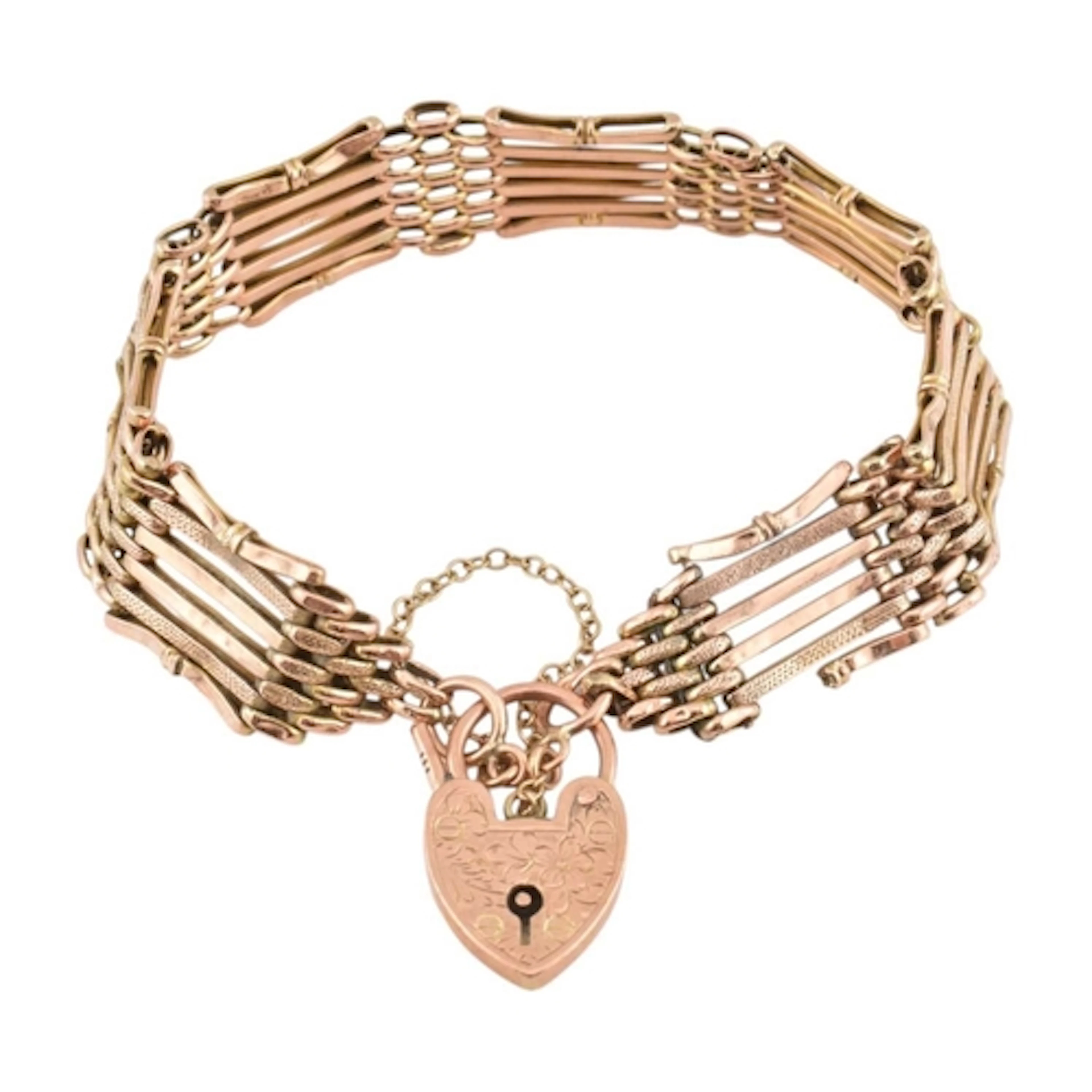 An early 20th century 9ct gold gate link chain bracelet with...