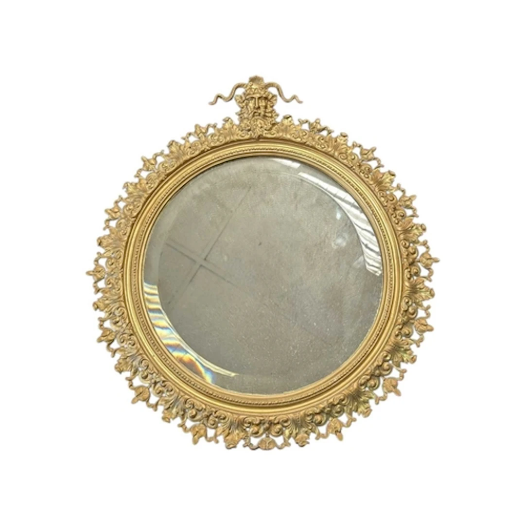 A 19th century French Neoclassical inspired gilt metal wall ...