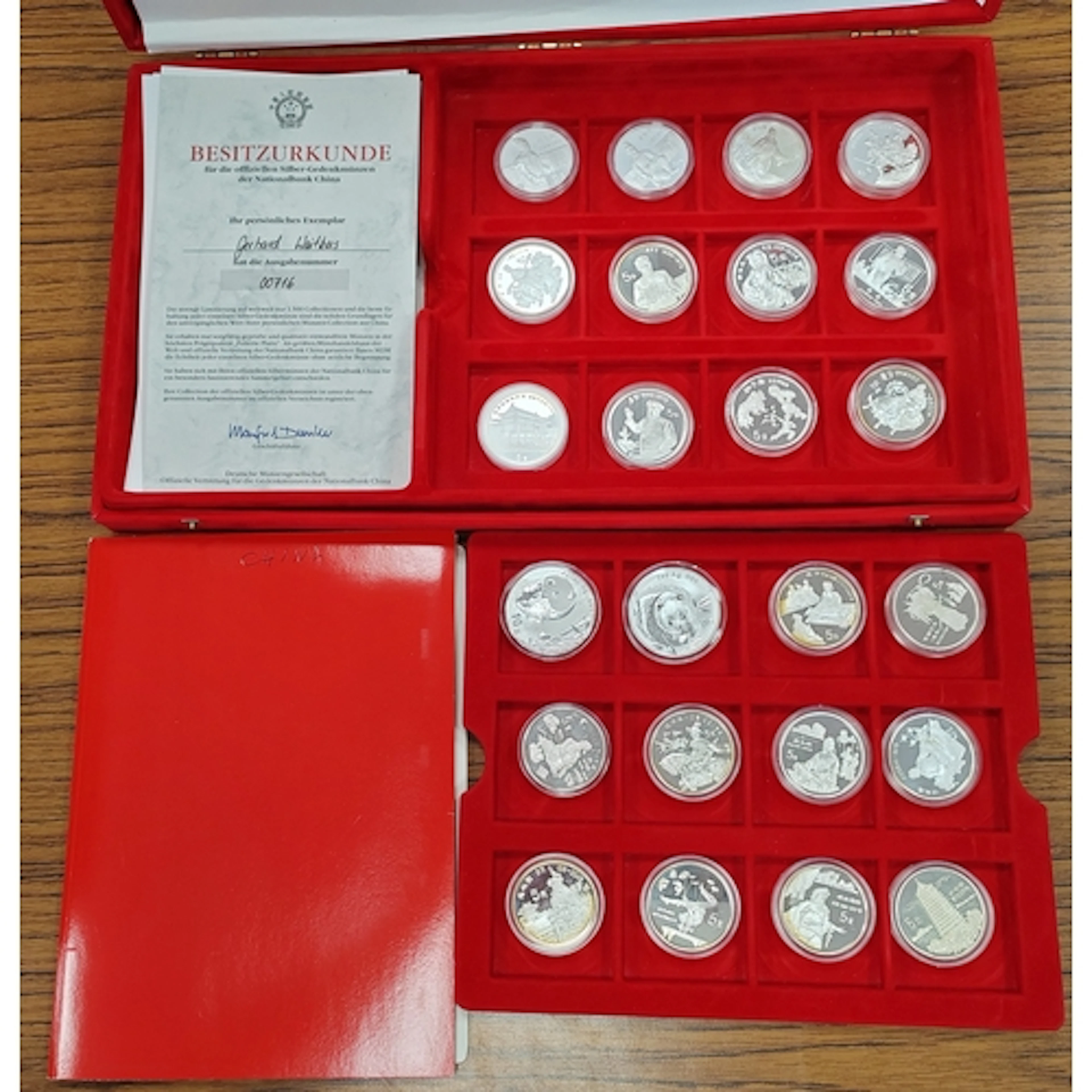 China. Collection of silver proofs FDC, presented in red pre...