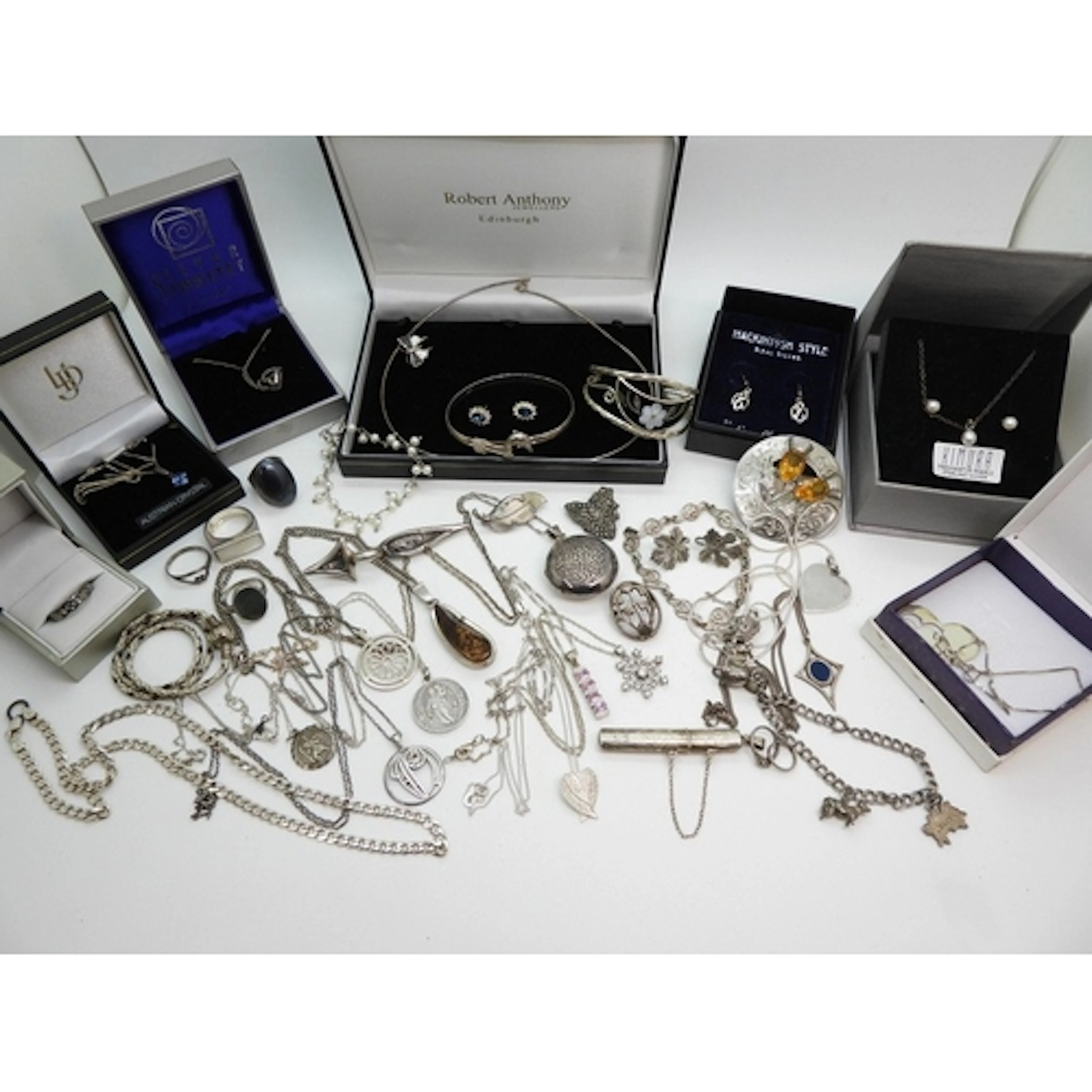 A collection of silver and white metal jewellery to include ...