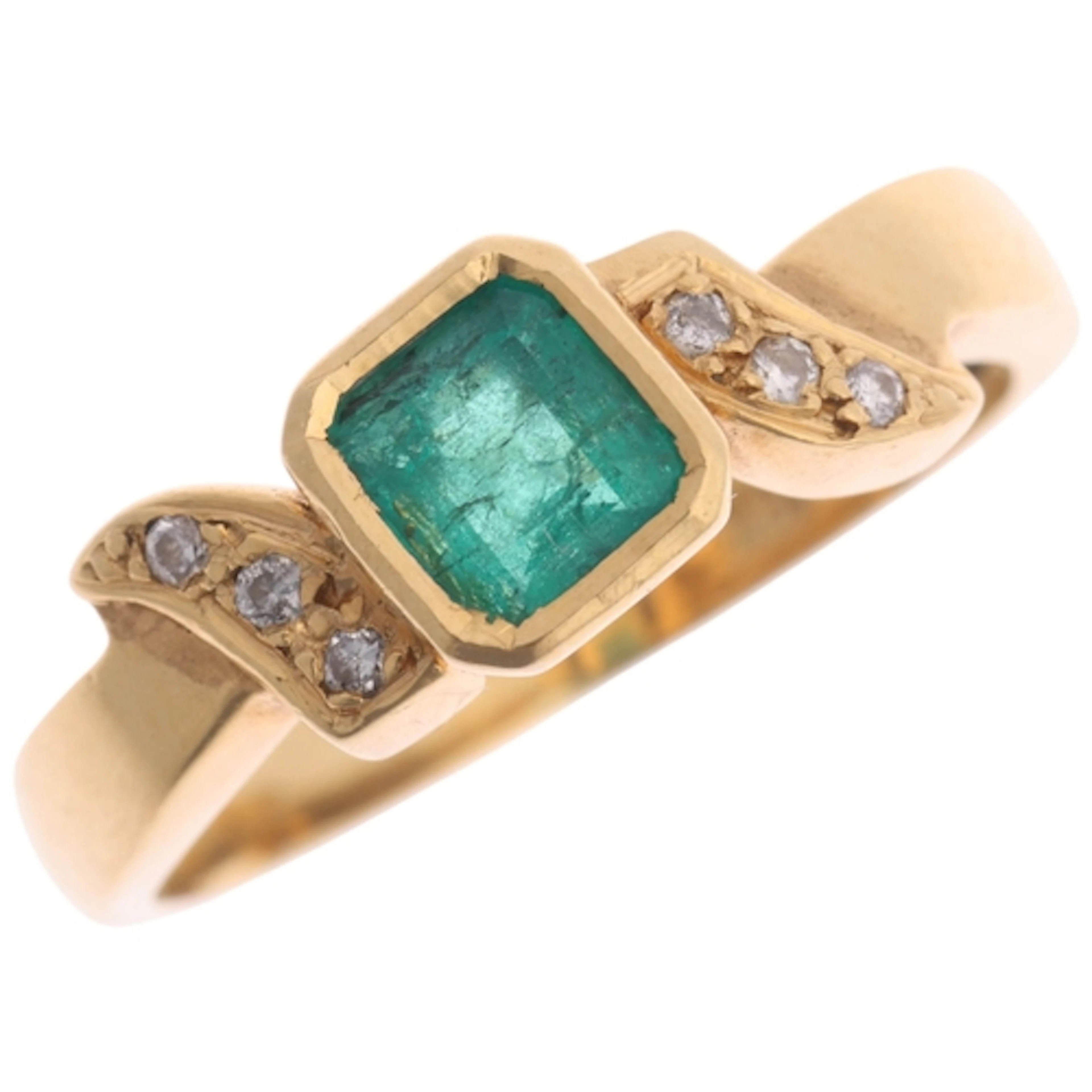 An 18ct gold emerald and diamond ring, rub-over set with 0.5...
