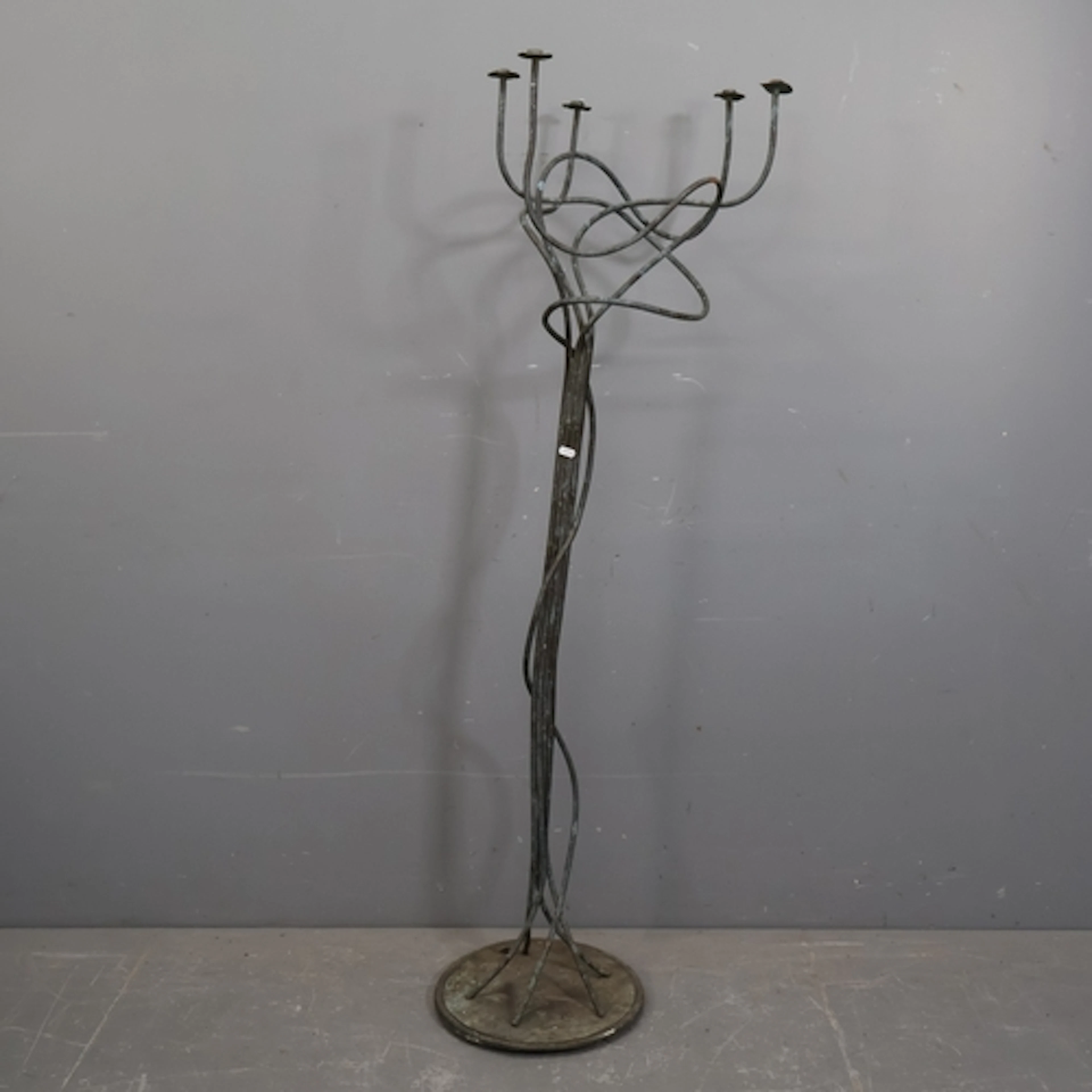 An abstract sculptural vintage copper candle stand. H157cm.