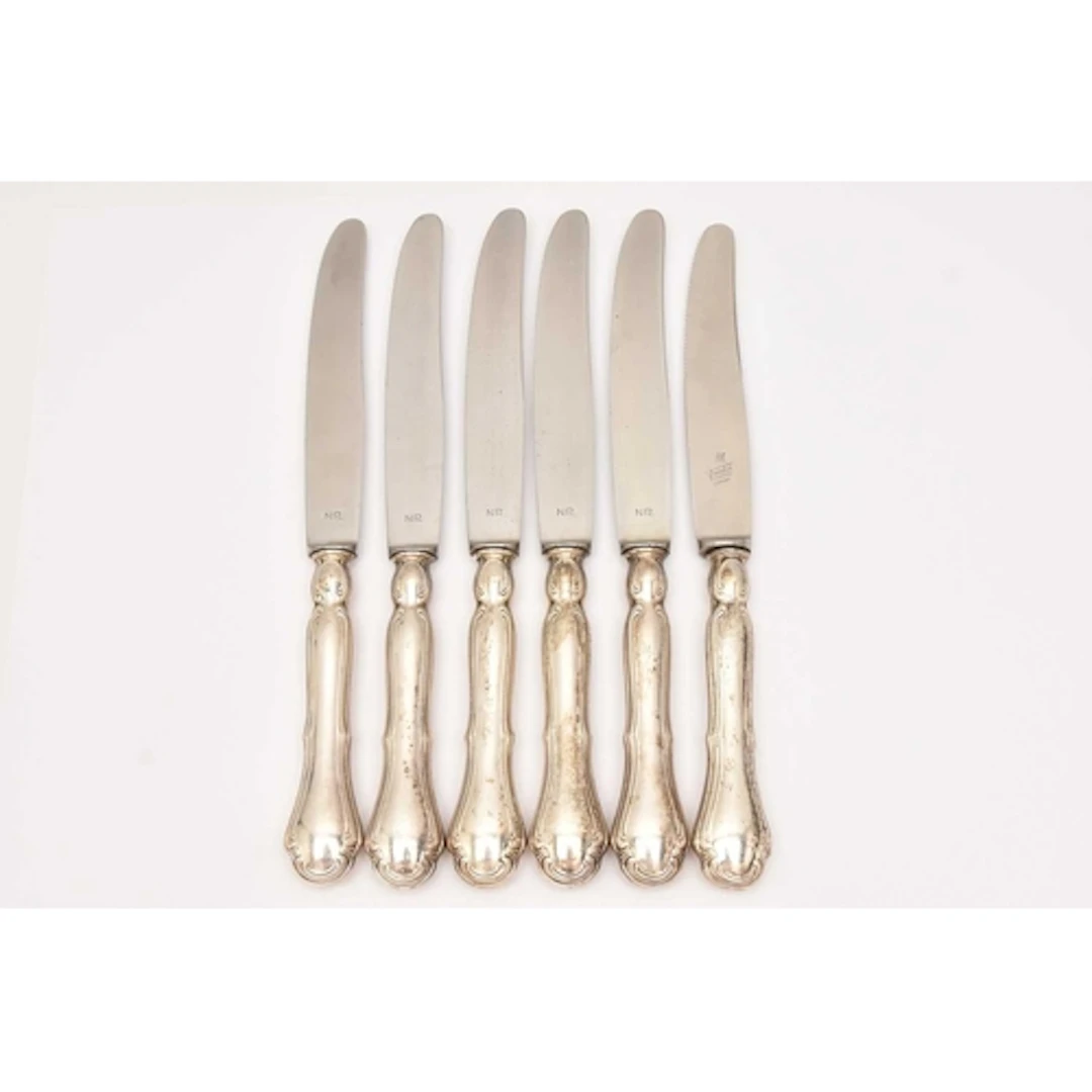 SIX WHITE METAL KNIVES, each stamped 800, Germany control ma...