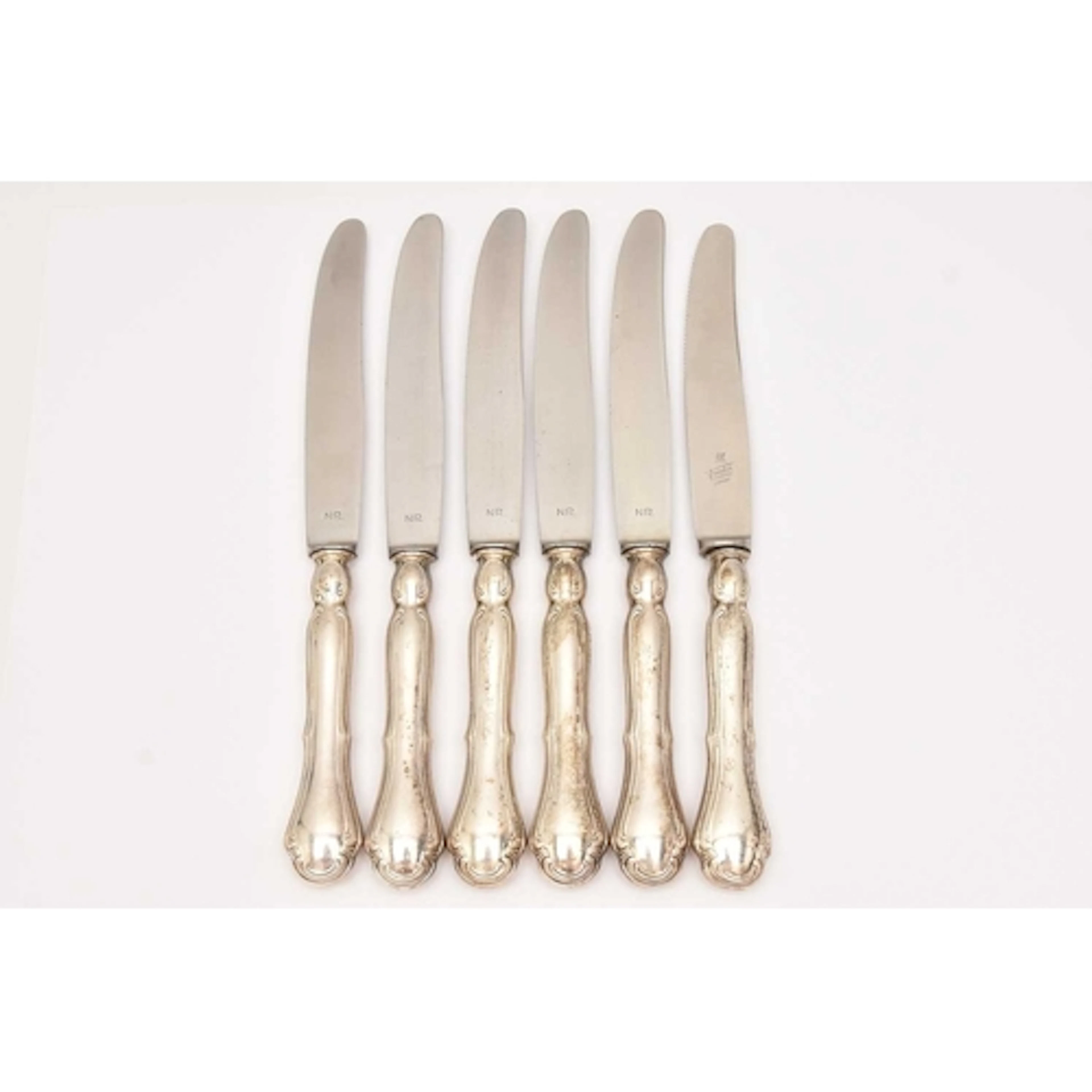 SIX WHITE METAL KNIVES, each stamped 800, Germany control ma...