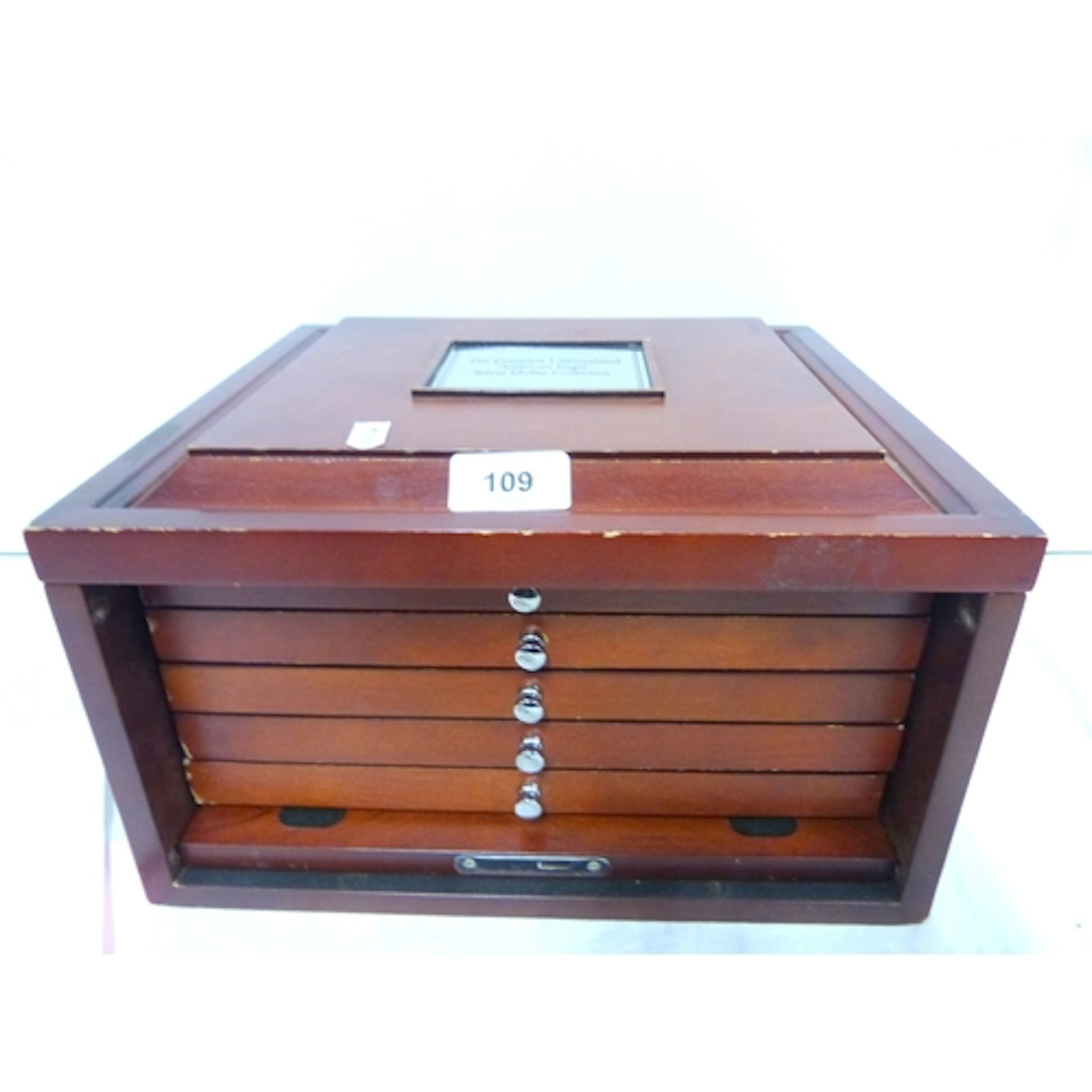 Large coin collectors box for silver dollars.