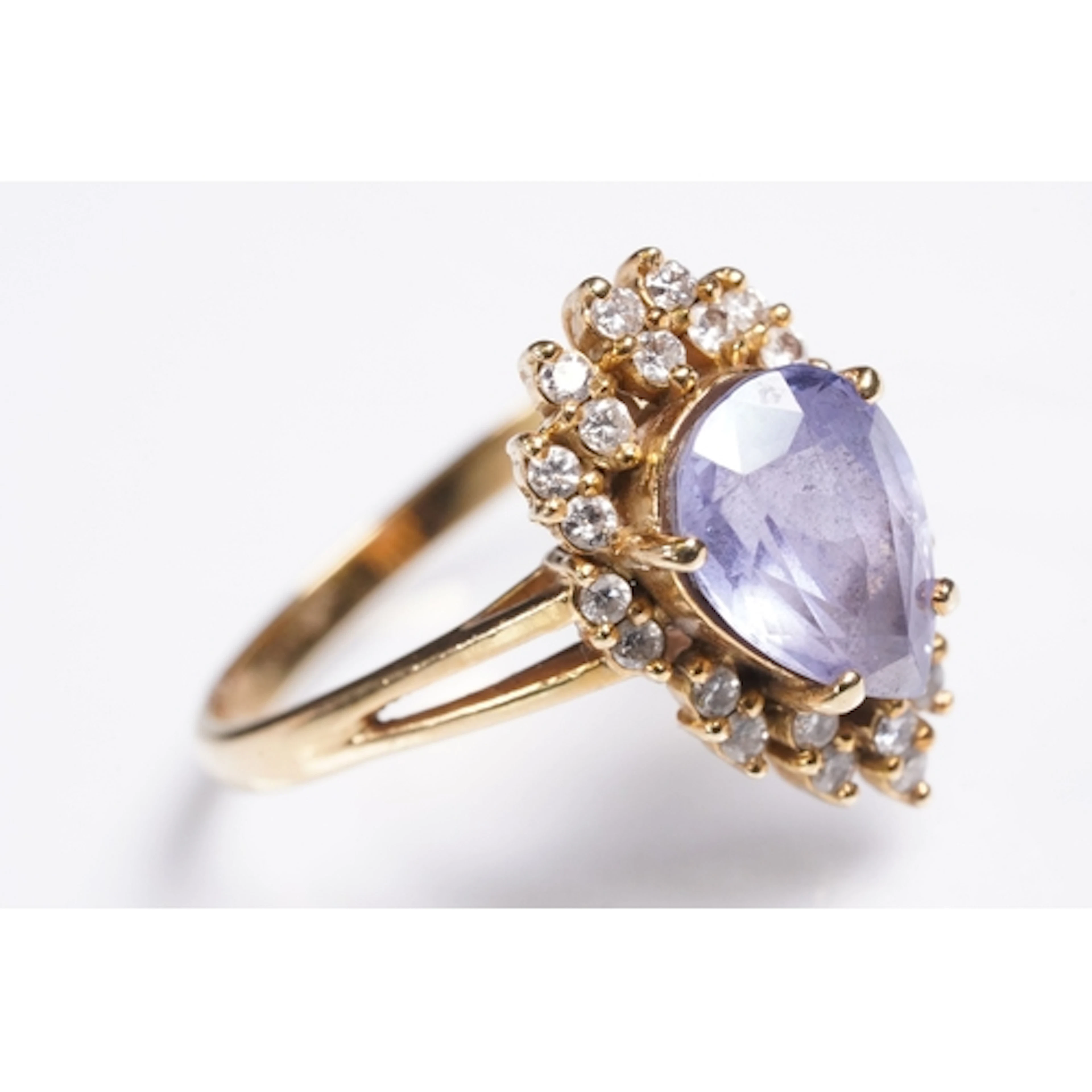 18ct gold, iolite and diamond ring. The ring being set with ...
