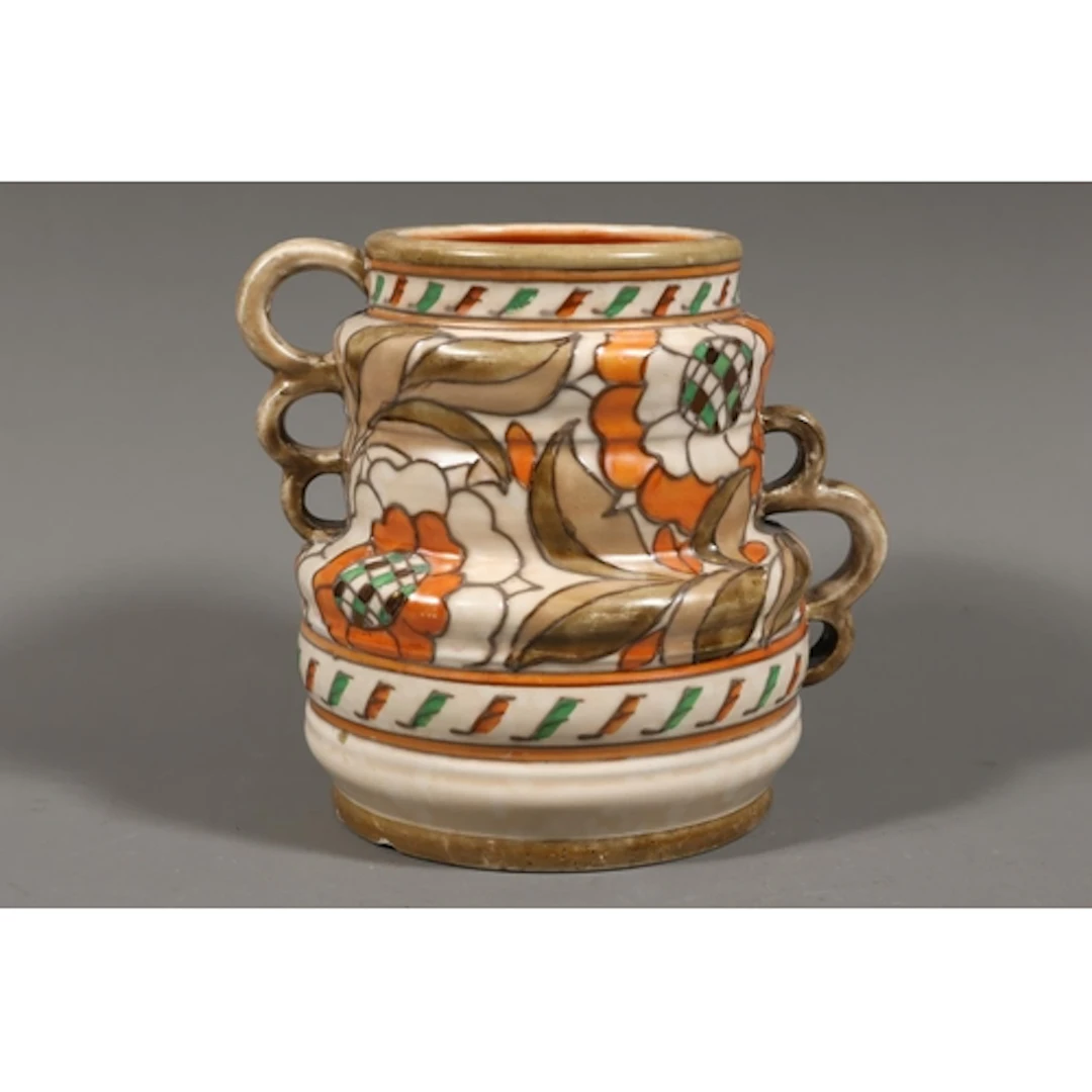 Crown Ducal vase by Charlotte Rhead, with foliate decoration...