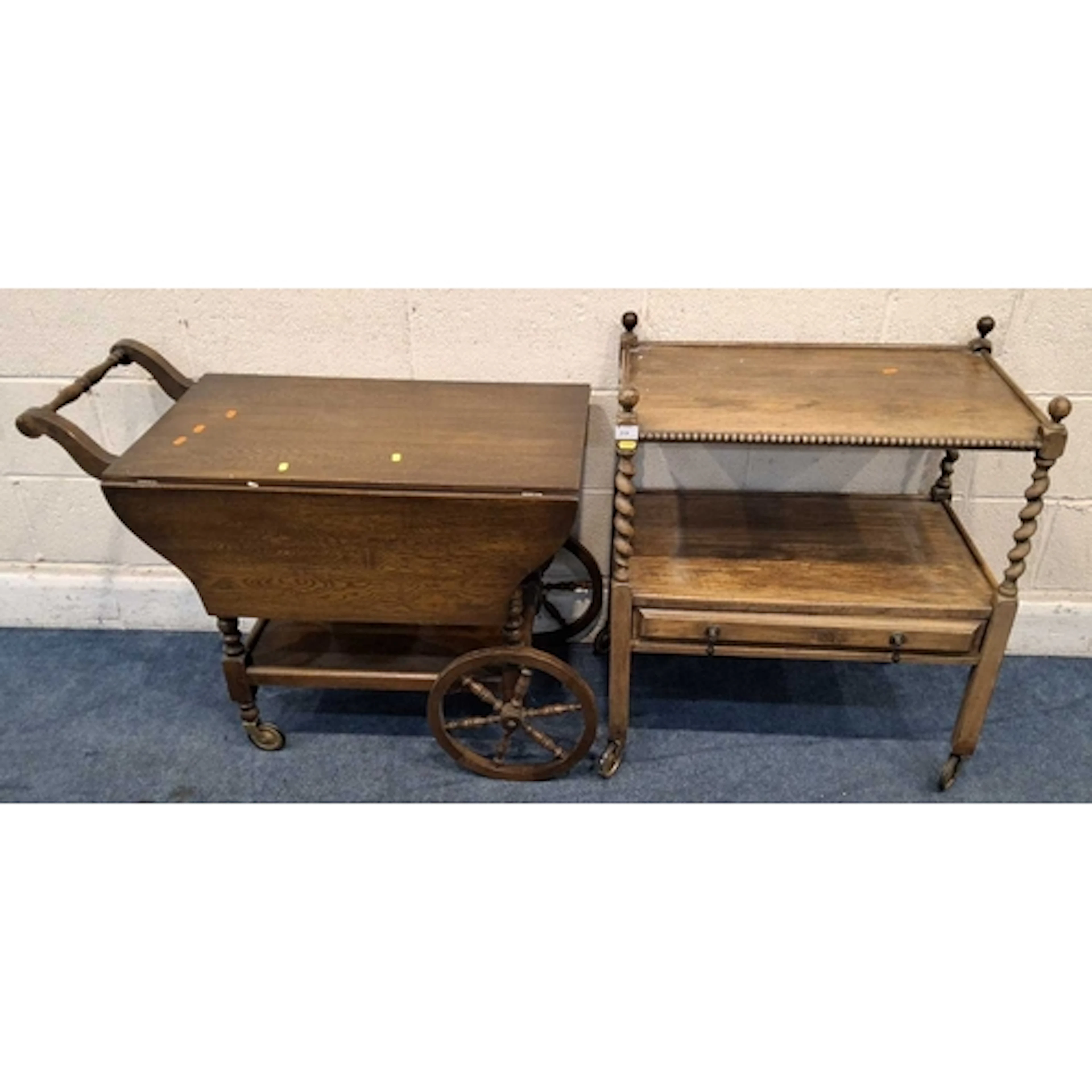 TWO EARLY 20TH CENTURY OAK TROLLEYS, each with two tiers, th...