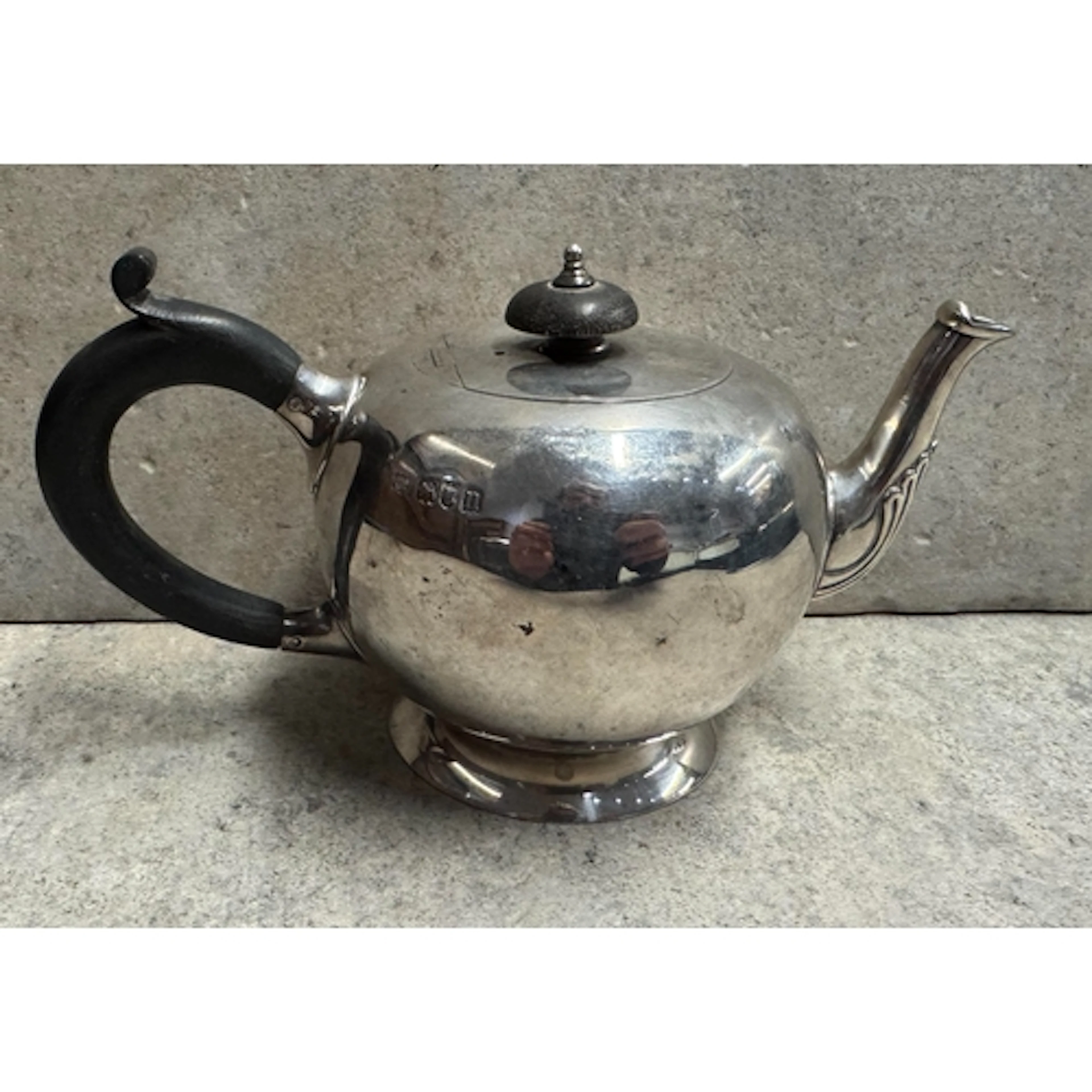 A silver bullet-shaped teapot in the Georgian style. London ...