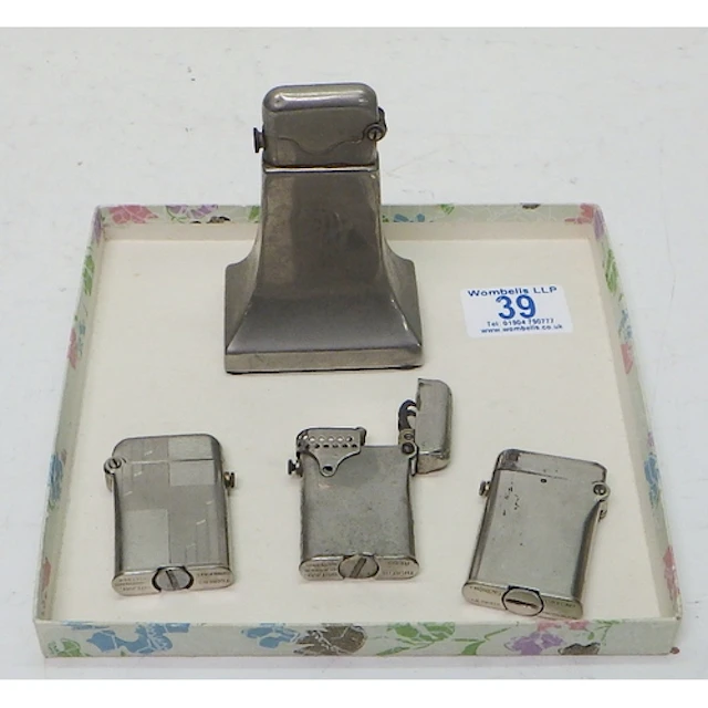 A group of three and one Thorens lighters, all sold as found...